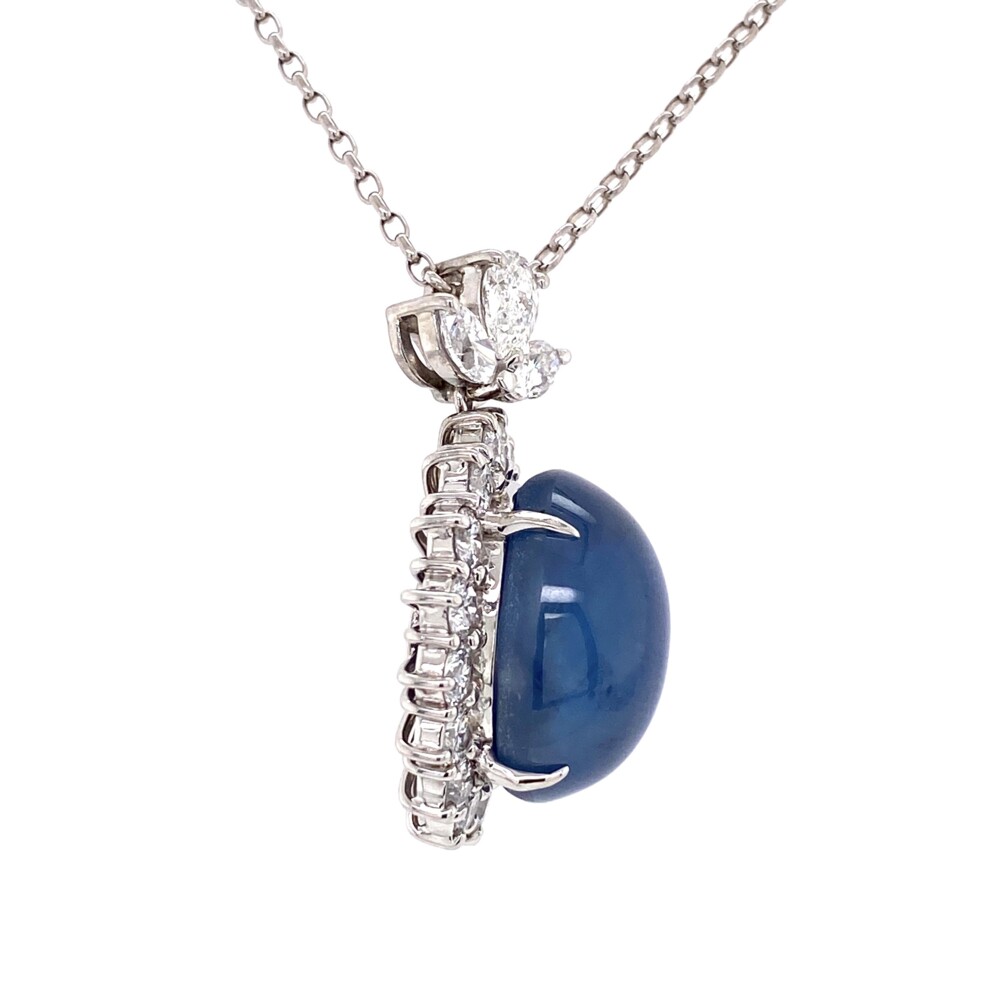 Check out this amazing rare natural star sapphire set with beautiful diamonds as a necklace pendant. 17 round brilliant & 3 marquis diamond weigh 2.99tcw and the center oval cabochon blue star sapphire weighs 24.98ct. Stamped on the back is "SS 24.98, D 2.99, Pt900" 24.98ct Natural Star Sapphire & 2.99tcw Diamonds in Platinum Pendant 20g, 20" Chain