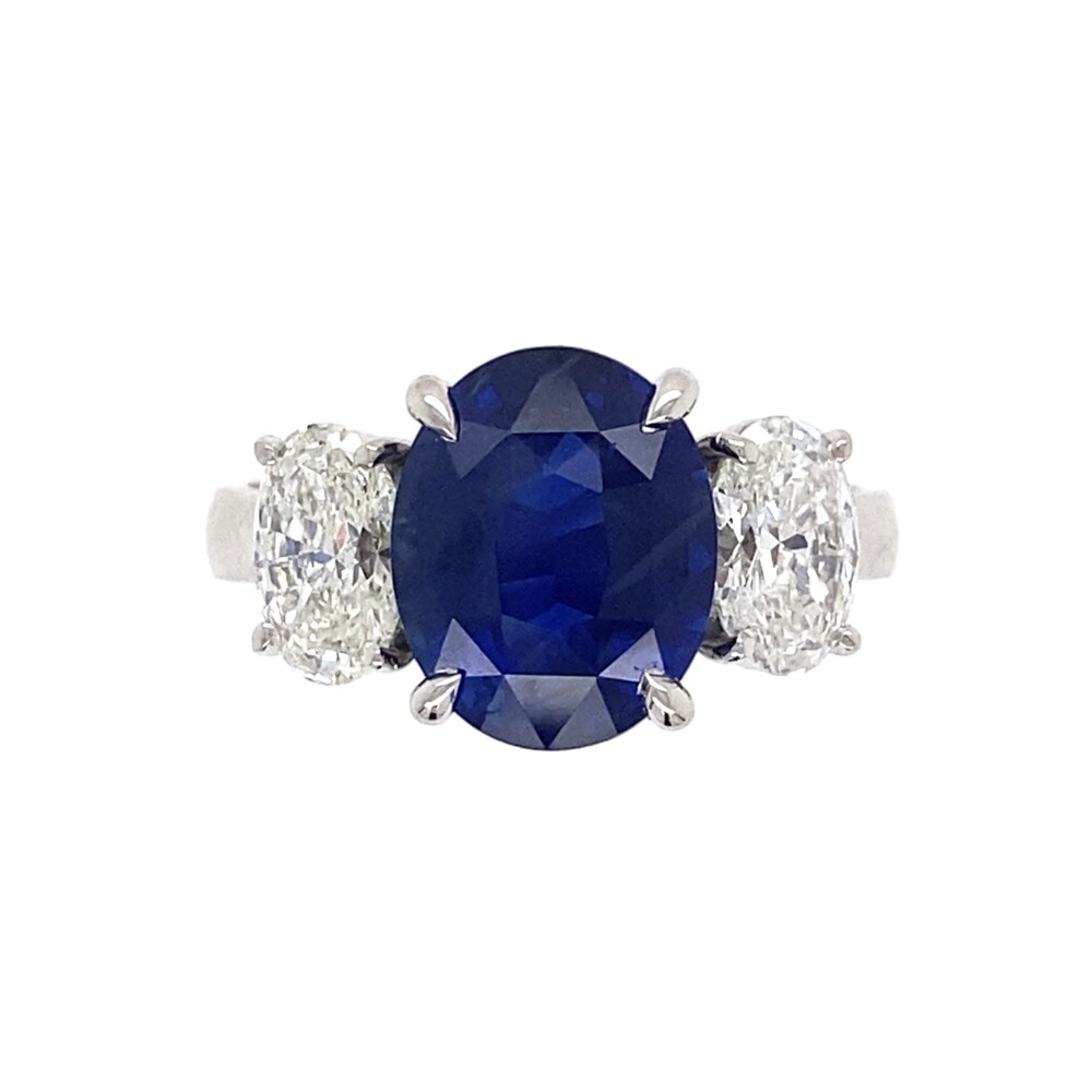 Check out this 3 stone ring will all Ovals; the center beautiful natural sapphire is 3.39ct, has natural diamond ovals on either side weighing approx. 1.12tcw G color, VS2 clarity all in a handmade platinum three stone ring made for these stones! Platinum 3.39ct Oval Sapphire & 1.12tcw Oval Diamond Ring, s6.5