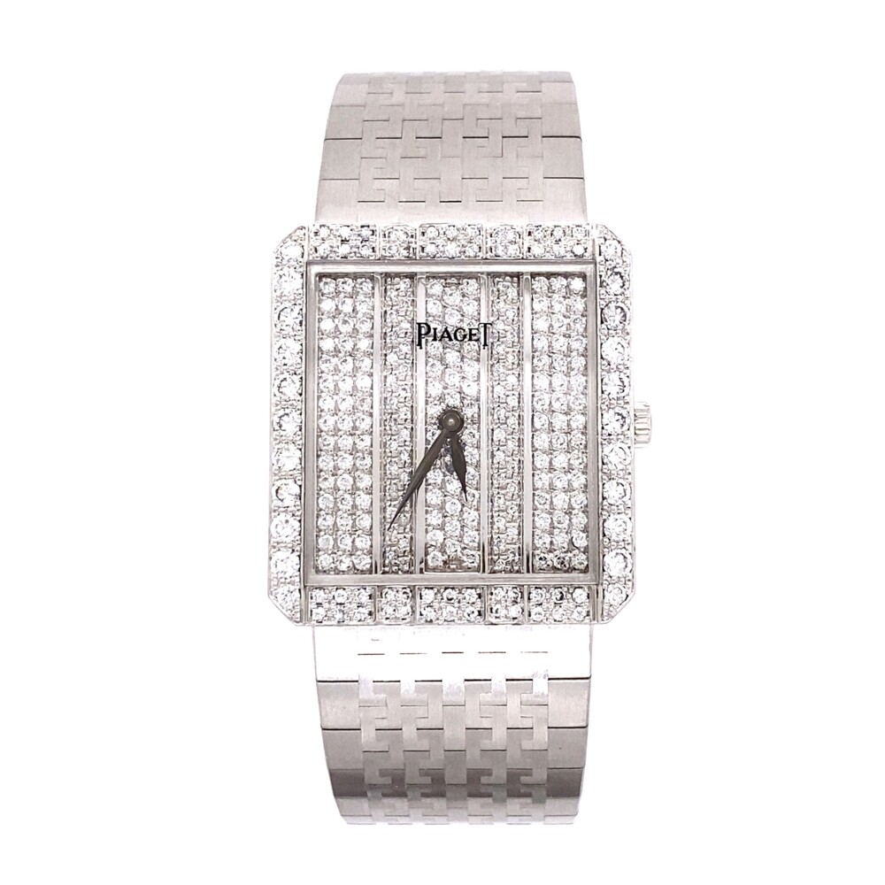 Wow! Look at this mint Piaget rectangular dress watch with diamonds in brand new condition, 25 x 27.5mm, 6.5 bracelet length. There are approx. 2tcw of diamonds E/F color, VS clarity Piaget 81635 A2 2.00tcw Diamond Dress Watch 18K WG 82.4g