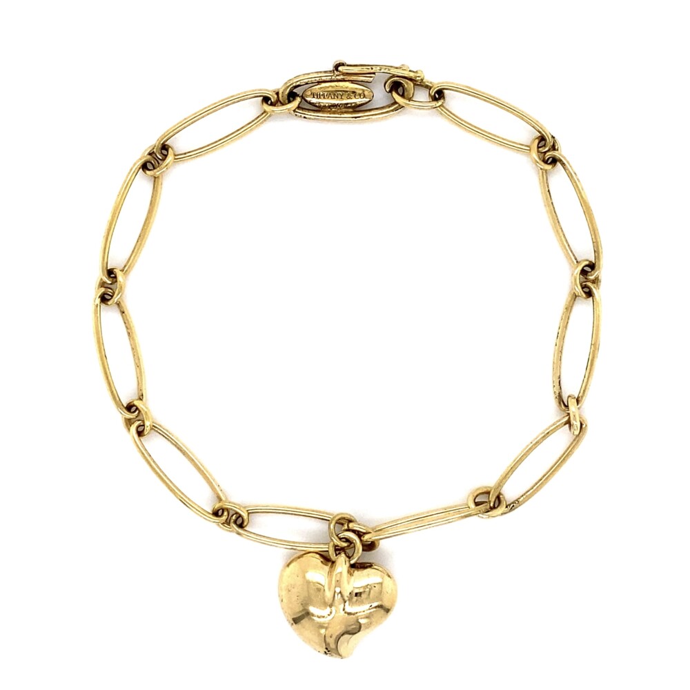 TIFFANY & CO Elsa Peretti open link with heart charm bracelet in rich 18K yellow gold, stamped, "Tiffany & Co, 750" and signed, "Elsa Peretti, SPAIN". TIFFANY & CO 18K YG Elsa Peretti Heart Charm Bracelet 10.8g, 7"