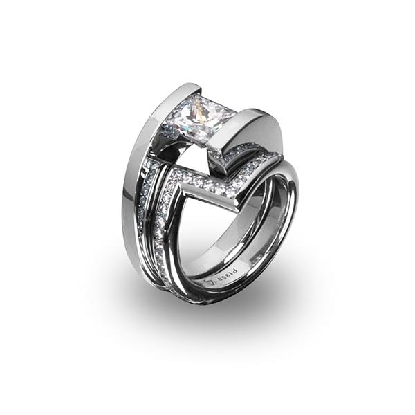 In stock, U.S. size 6.25 with 24 diamond melee made for truncated helix rings with 1.01-1.50 Ct center stones. The Zig with pave band is designed to be paired with a variety of our helix rings or worn separately. Available in platinum and 18-karat yellow, rose, or white gold, with a shiny, matte or half-matte finish. Call for pricing variations. Zig Band with Pave Pt 950 8.5g for 1.01 - 1.50 Ct Helix Ring
