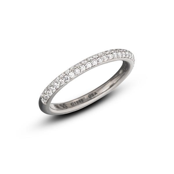 The Omega Band 2 Row Pave Halfway Around features two rows of diamonds and is designed to correspond with the Omega Ring's profiles, but can be worn alone or in a ring stack. The diamonds stretch across half of the diameter of this band. Available in platinum and 18-karat yellow, rose, or white gold. For finger sizes Omega Band 2 Row Pave Halfway Around Pt950 2 mm