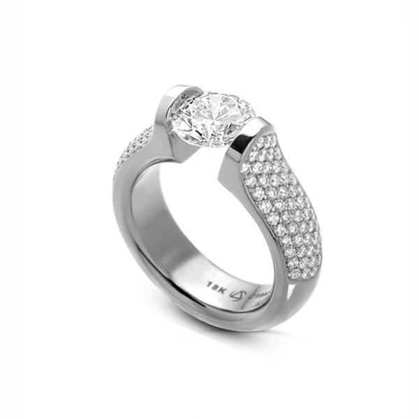 In stock, U.S. size 5.75, with pave diamonds set in platinum and a 7 mm round CZ. The 5-Row Pave Omega is offered in platinum and 18-karat yellow, rose, or white gold. This ring features approximately 128 pave set diamonds. Available in shiny finish. Center Stone NOT included. All rings are made to order based upon center stone and finger size. Call for pricing variations. 5-Row Pave 5/8 Ct Omega Pt950 15.6g 7mm RD CZ