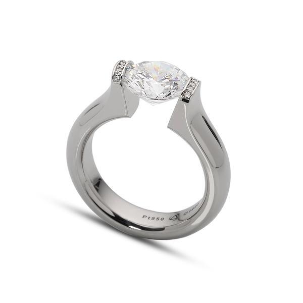 In stock, U.S. size 6.25, in high polish platinum, set with a 8.2mm round CZ. A sparkly twist on our classic Omega Round. The classic Omega Round ring with pave lips is offered in platinum and 18-karat yellow, rose, or white gold. Finishes include matte or shiny. Center Stone NOT included. Call for pricing variations. Omega Round Pave Lips Pt950 13.5g 8.2 mm Round CZ