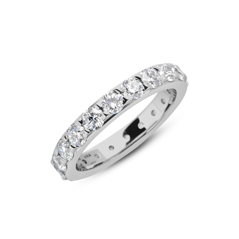 In stock, U.S. size 6.75 in platinum. Meaning "halo" the Hala bands represent eternity in a glittering display of diamonds. The Stellina Blue Hala Band is 3.3 mm Wide with (20) 3mm diamonds entirely around. Approximately 2ctw.<br> Hala Band 3.3mm in Platinum, 5.9g, Size 6.75