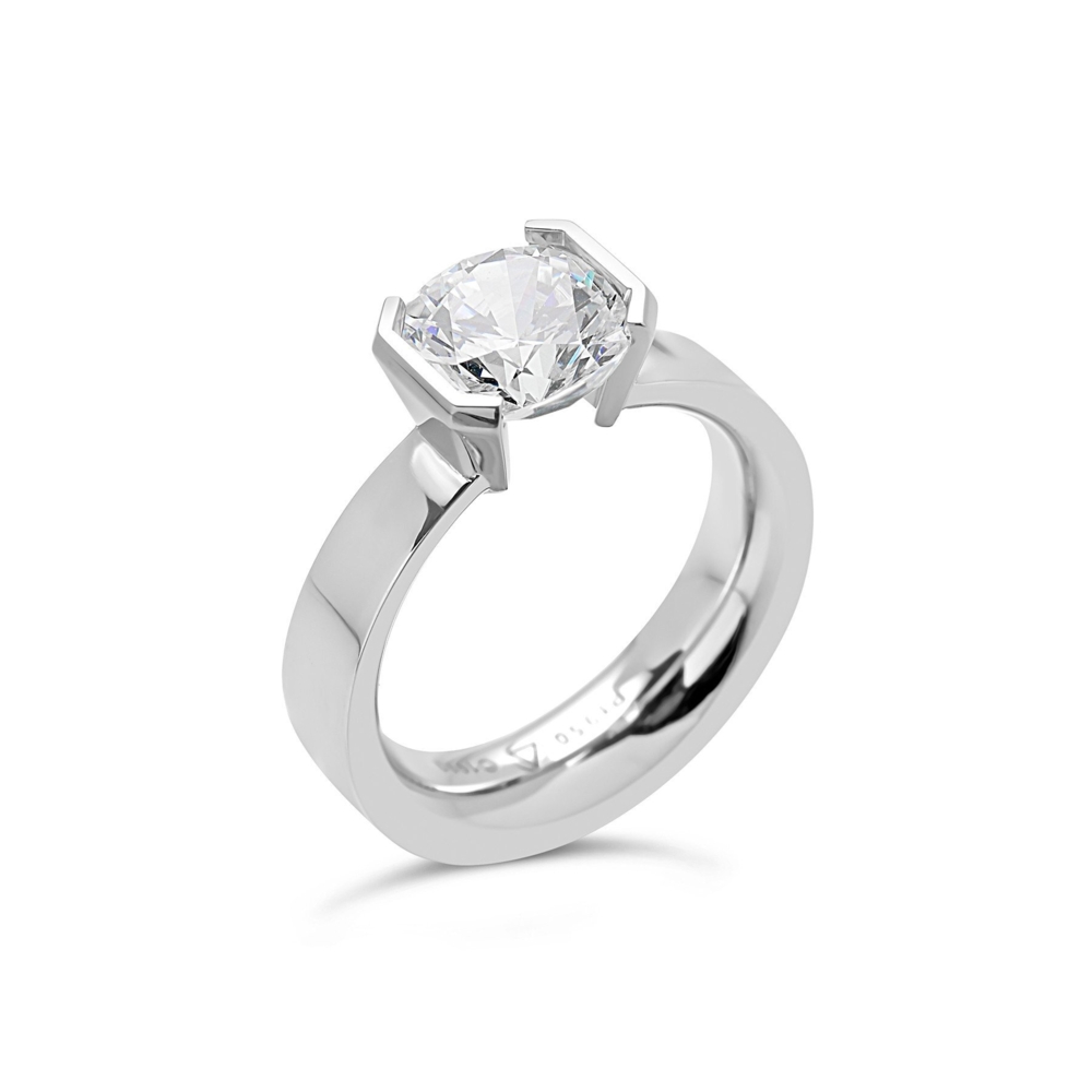 In stock, U.S. size 6.5, in 18kt white gold, set with a 7.5mm round CZ. Center Stone NOT included.<br> Round Elara ring in 18K White Gold Size 6.5