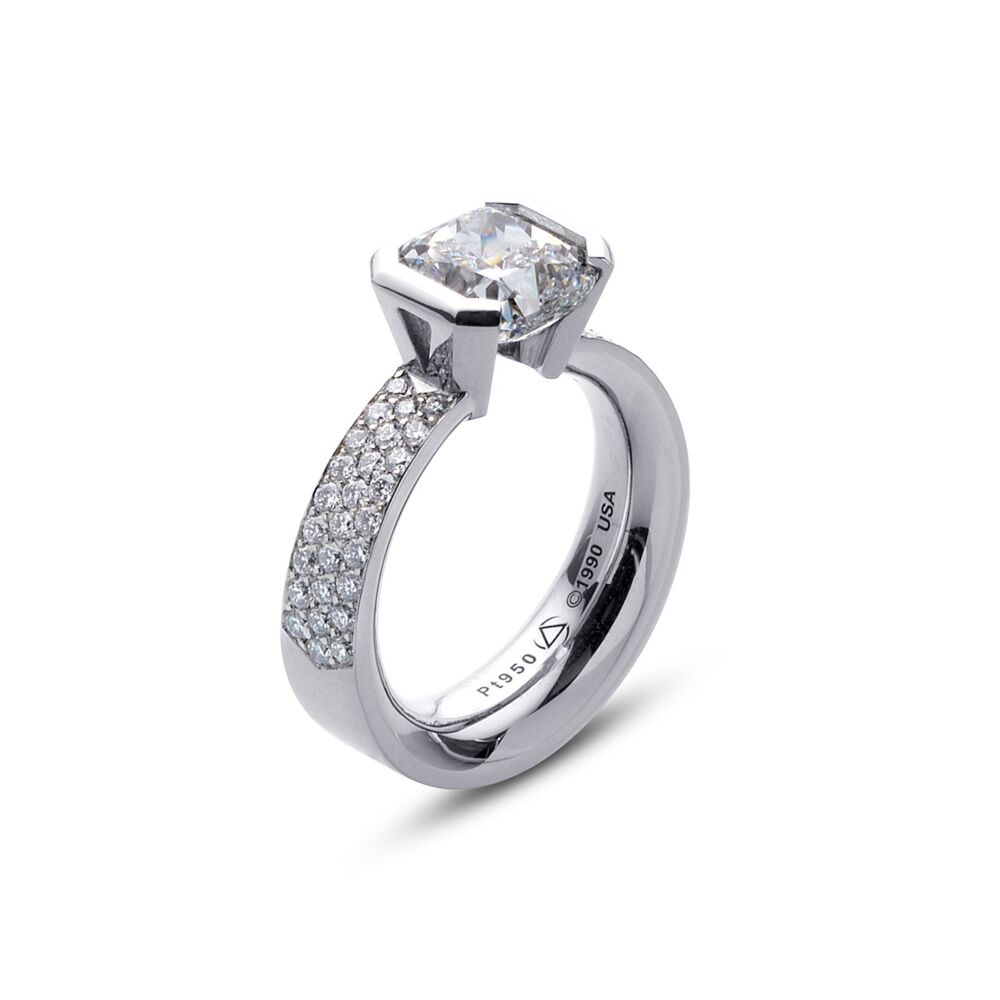 In stock, U.S. size 3.75 mm, in platinum with a 7.5 mm Cushion CZ. This ring features approximately 54 diamond pave set melee. Center Stone NOT included. Flat Elara Ring in Platinum with Pave Size 3.75