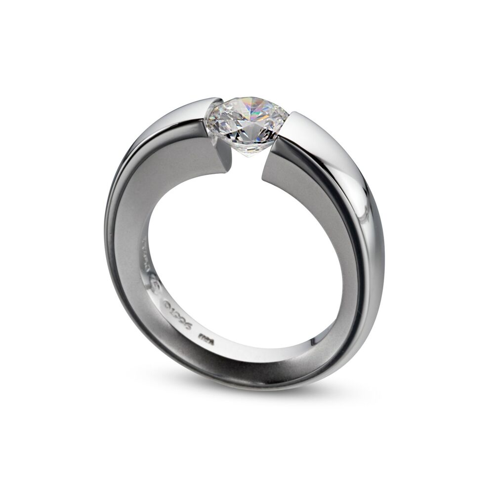 In stock, U.S. size 6.25, with high polish and undercut shoulders with a matte finish, and set with a 6.5mm round CZ. Width of ring is 70% of center stone diameter. Center Stone NOT included. WUSH Ring in Platinum Size 6.25