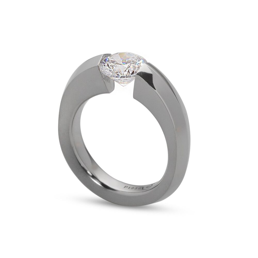 In stock, U.S. size 6.5, in platinum with a half matte finish, and set with a 7.5 mm round CZ. Center Stone NOT included. Blade Ring in Half Matte Platinum Size 6.5