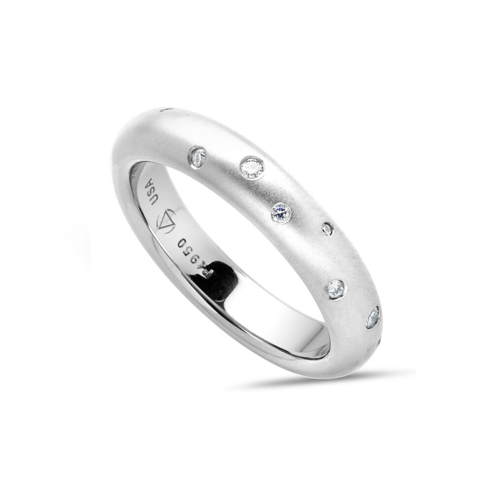 In stock, U.S. size 6.25, in our half matte and half high polish platinum finish, 4 mm wide. Matching the Omega ring's profile, the corresponding Omega Band comes in a 4mm width and 15 diamond accents to create a cool, scattered look.<br> Omega Band in Platinum with Scattered Melee 4mm Size 6.25