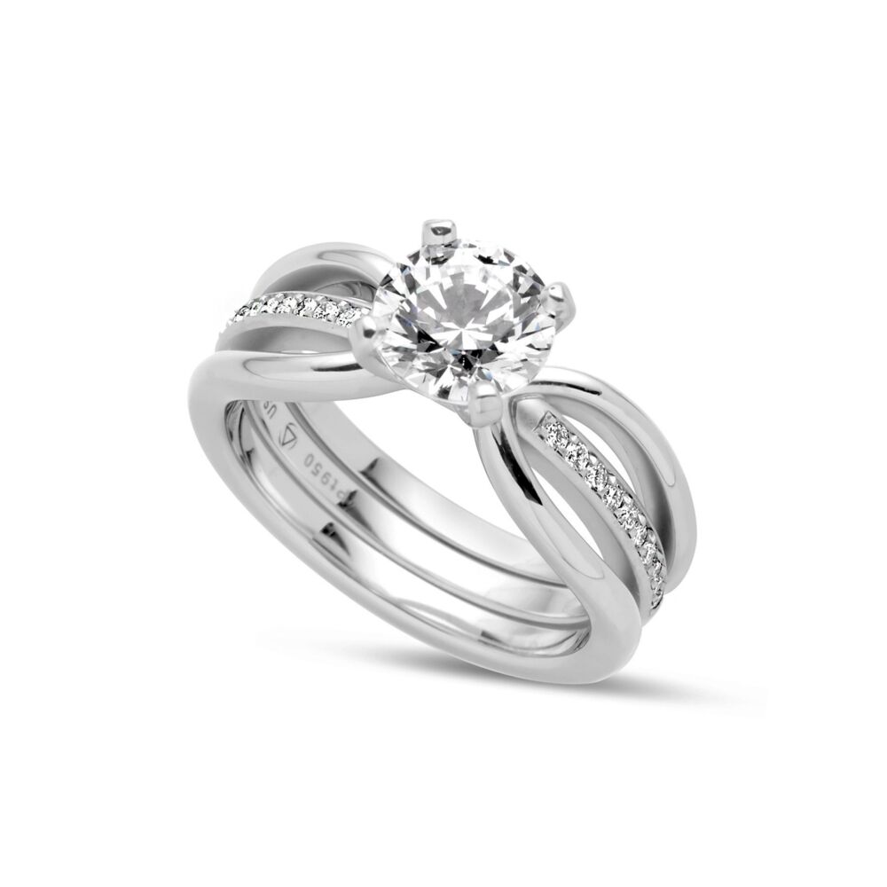 In stock, U.S. size 6, with the inner band in our matte finish, and outer bands in a high polish, set with a 7 mm CZ. Derived from Latin and related to the Greek name Helene, Eliana means "Of the Sun" and is a popular name in Portugal, Italy, and Spain.<br> Eliana Ring in Half Matte Platinum Size 6