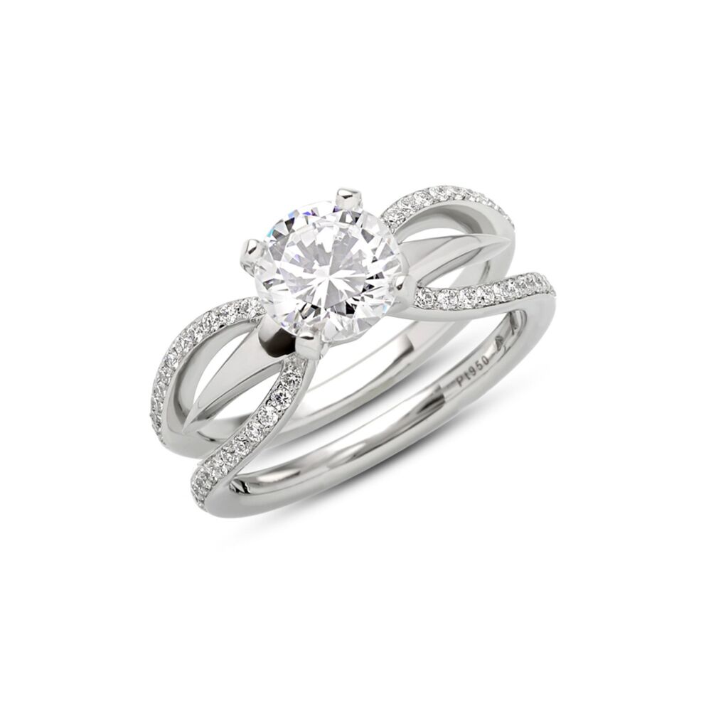 In stock, U.S. size 6.5, set with 7.5 mm round CZ. A blend of classic style with a bit of Kretchmer edge, this ring was named Kira because of the beautiful meanings it draws from around the world. It is Persian for "Sun" or "Beam of light", Russian for "Beloved" and in Japanese it means 'Glittery, shiny." The Kira ring embodies all of these elements.<br> Kira Ring in Platinum Size 6.5