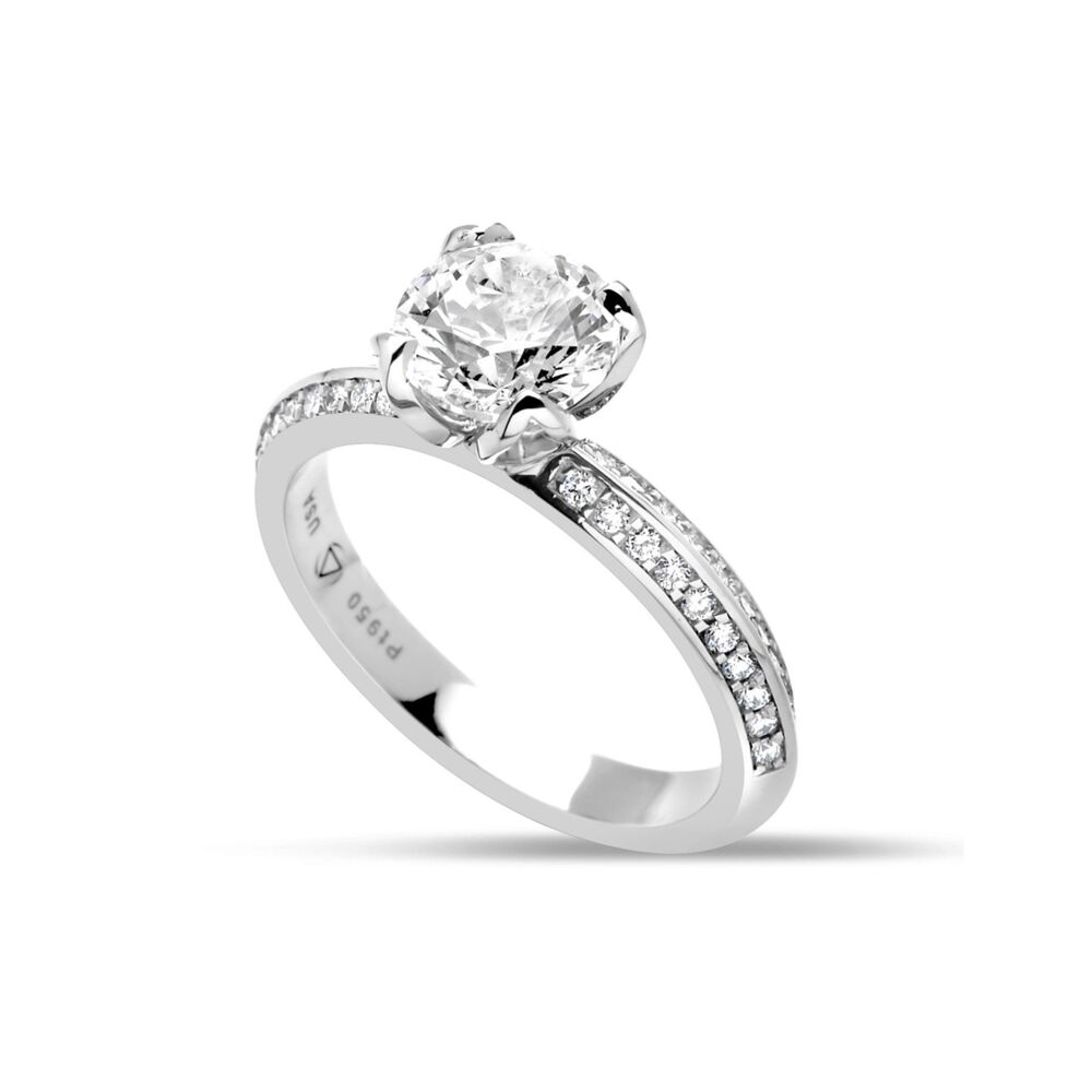 In stock, U.S. size 6.25, in platinum, set with a 7mm round CZ. Symbolizing a beautiful flower, and the Greek word for "Rainbow" the Iris ring blends a cool diamond gothic edge with the soft custom petals holding the center stone. Center Stone NOT included.<br> Iris Ring in Platinum Size 6.25