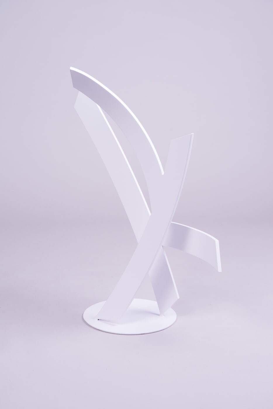 This awe-inspiring white sculpture by artist Miguel Edwards is made of steel with a powder coat. Ghost explores underlying forms and concepts intrinsic in the dynamic between our sleeping and waking lives — as well as the visual logic of human perception. Ghost