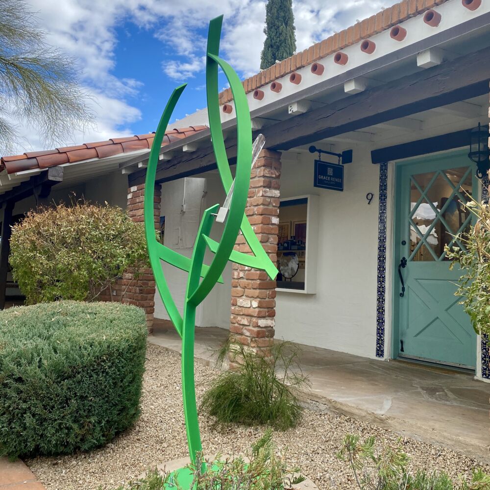 This gorgeous green sculpture by artist Miguel Edwards is made of steel and glass with an iridescent powder coat. Titan explores underlying forms and concepts intrinsic in the dynamic between our sleeping and waking lives — as well as the visual logic of human perception. Titan