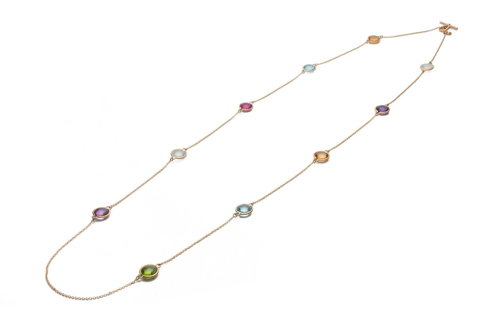 This beautifully bewitching 18K yellow gold pendant brought to you by Goshwara and designer Sweta Jain brings genuine ornateness. It features 10mm moon quartz (6.32 carats), blue topaz (8.50 carats), amethyst (5.97 carats), citrine (6.40 carats), rubelite (3.46 carats) and peridot (2.75 carats) discs. Mischief Multicolor Necklace