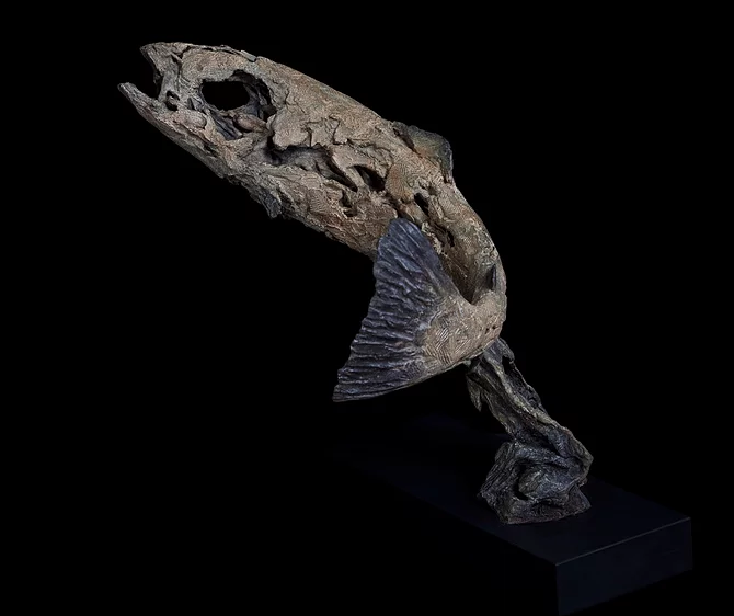 This bronze sculpture by artist Joseph Paxton expresses the physical and psychological juxtapositions of strength, vulnerability, simplicity and complexity. Leaping Fish explores the connection between living beings and the environment. Leaping Fish