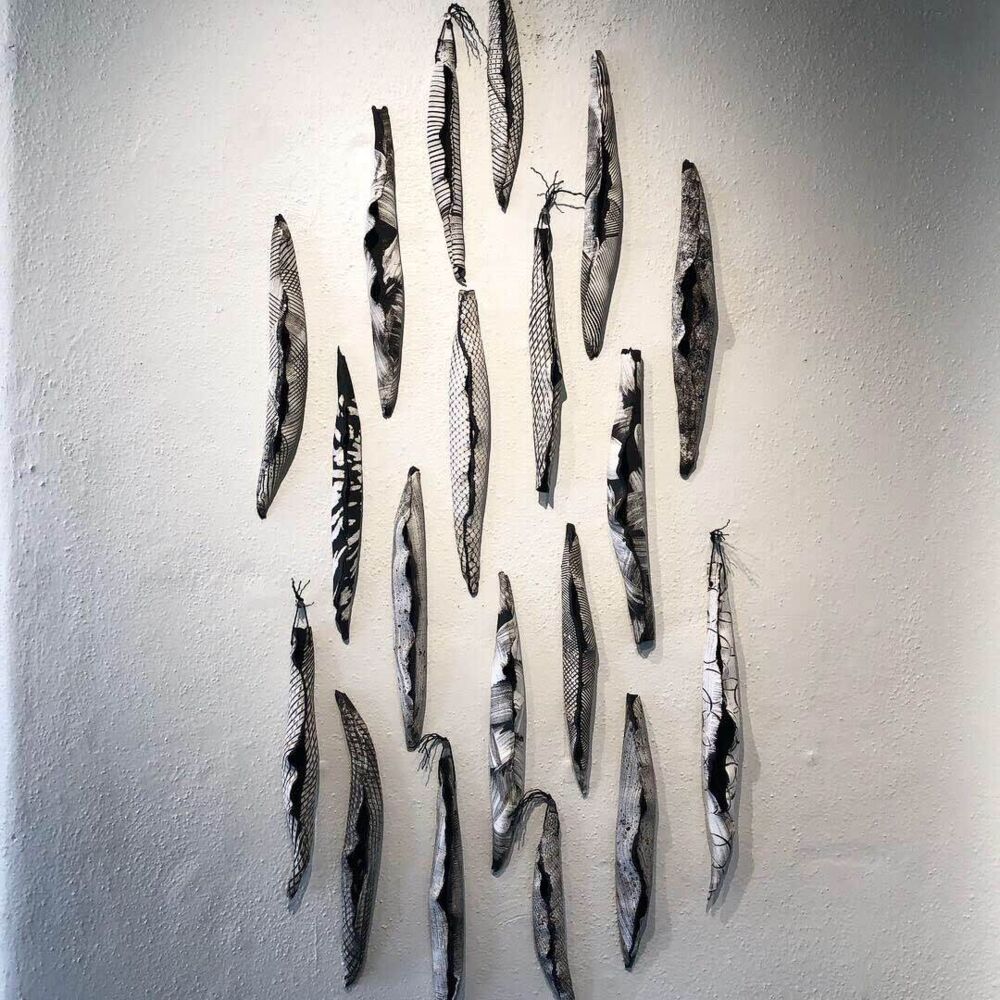 This gorgeous ceramic wall sculpture by Jodi Walsh was created through a process called oritatami nendo, or folding clay. Inspired by nature, Seed Pods recreates the intimate connection we all feel to nature. Seed Pods