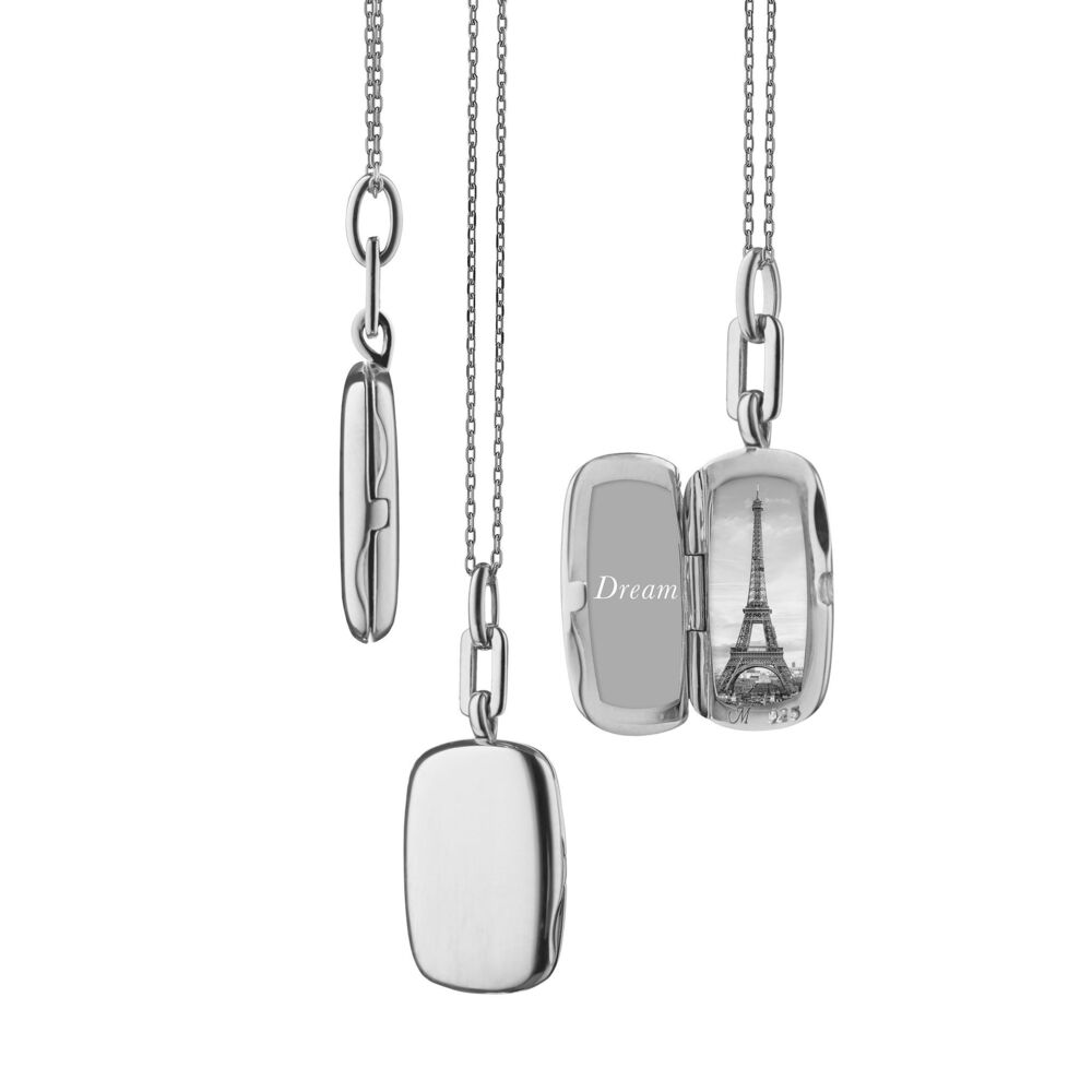 This sincerely superb sterling silver slim rectangular “Dee" locket brought to you by Monica Rich Kosann brings grace and sophistication. It comes with an 18" diamond cut chain. “Dee” Locket (Sterling Silver)