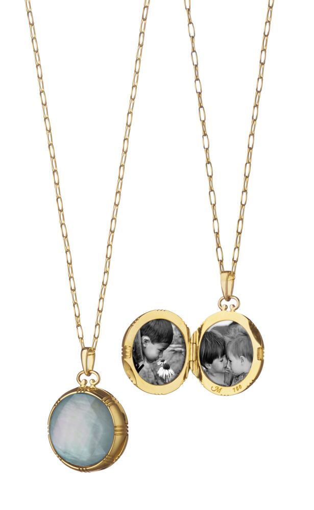This truly dazzling 18K yellow gold double-sided locket brought to you by Monica Rich Kosann brings absolute beauty and elegance. It features a one-of-a-kind blue topaz over mother of pearl and comes with a 30" small delicate chain. Blue Topaz And Mother Of Pearl Locket