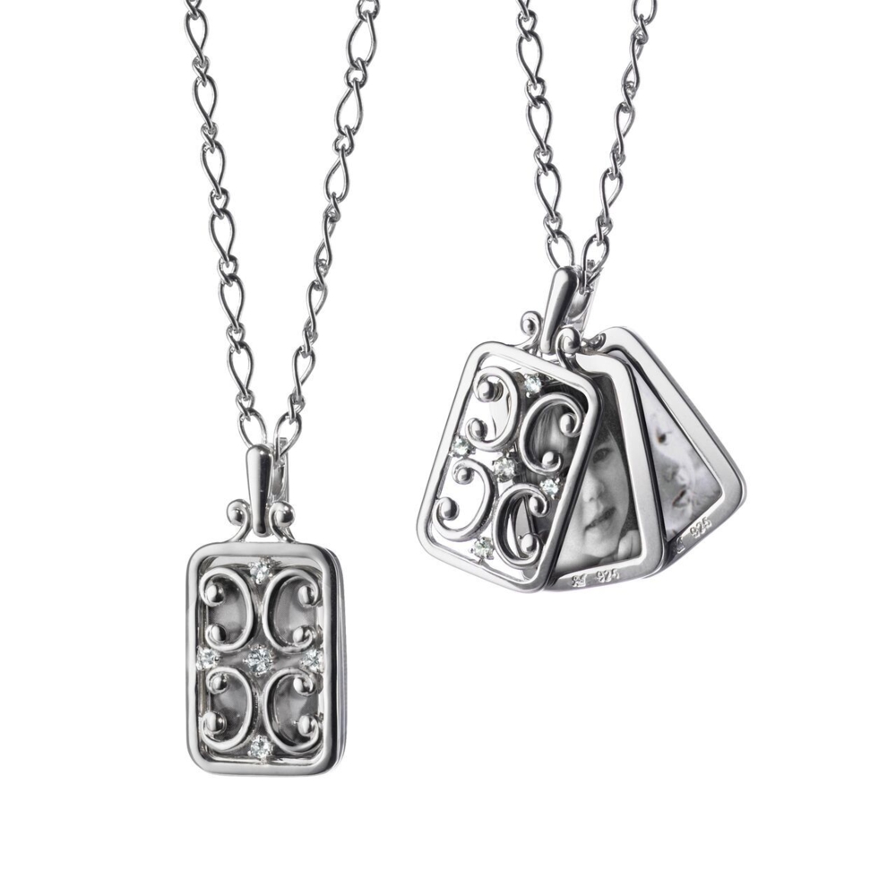 This genuinely lovely sterling silver rectangular gate frame necklace brought to you by Monica Rich Kosann brings alluring elegance. It comes with two image cases (one double-sided and one single-sided) and features exquisit white sapphire stones. Rectangular Gate Frame Necklace