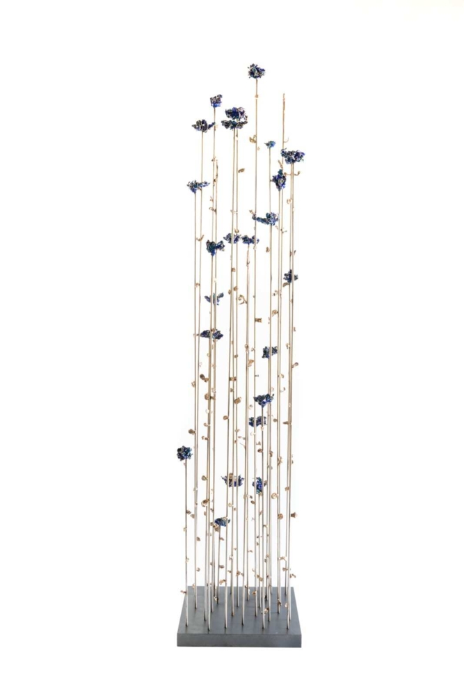 This freestanding sculpture by artist Jennyfer Stratman is comprised of bronze, stainless steel and pigment. In Our Empyreal Garden transcends the expected, is truly unique and is wonderfully executed. In Our Empyreal Garden