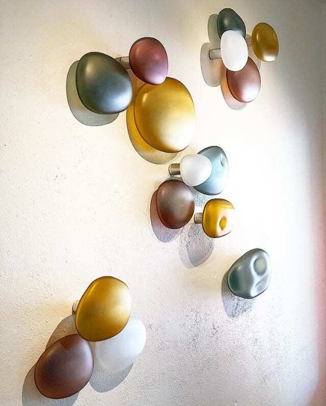 This wall sculpture by glass artist Christopher Jeffries accentuates the intimacy of relationships by adding a peaceful background vibe. Rock Series (Medium) features blown glass and steel. Rock Series Medium