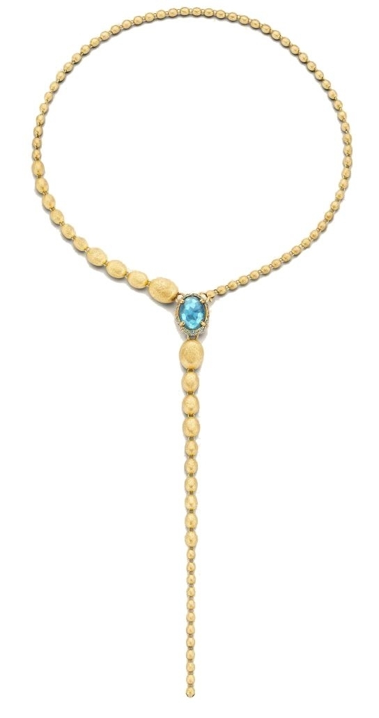 These incredibly lovely 18K yellow gold necklace brought to you by Nanis Fine Jewelry and Italian designer Laura Bicego brings remarkable distinction. It features graduated beads with a large London blue topaz bead on one side and pave blue topaz, blue diamond and sapphire on the other. A clasp attaches to necklace in two different ways to create a long strand or lariat style necklace. Dancing In The Rain Reverso Necklace