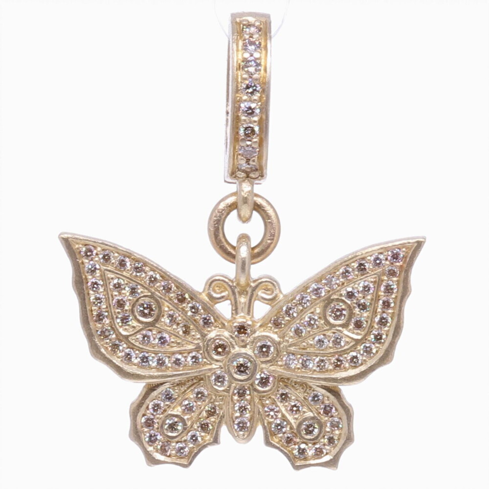 The butterfly is the symbol of resurrection and eternal life because they metamorphose from a caterpillar to a chrysalis and finally becomes a butterfly. Many believe that the soul left the body in the form of a butterfly. Aristotle named the butterfly 'psyche' which is the Greek word for Soul. This pendant has 4.99g 14k yellow gold and champagne diamonds 0.50 tcw. The bale has a 4mm opening. Classic Butterfly Pendant