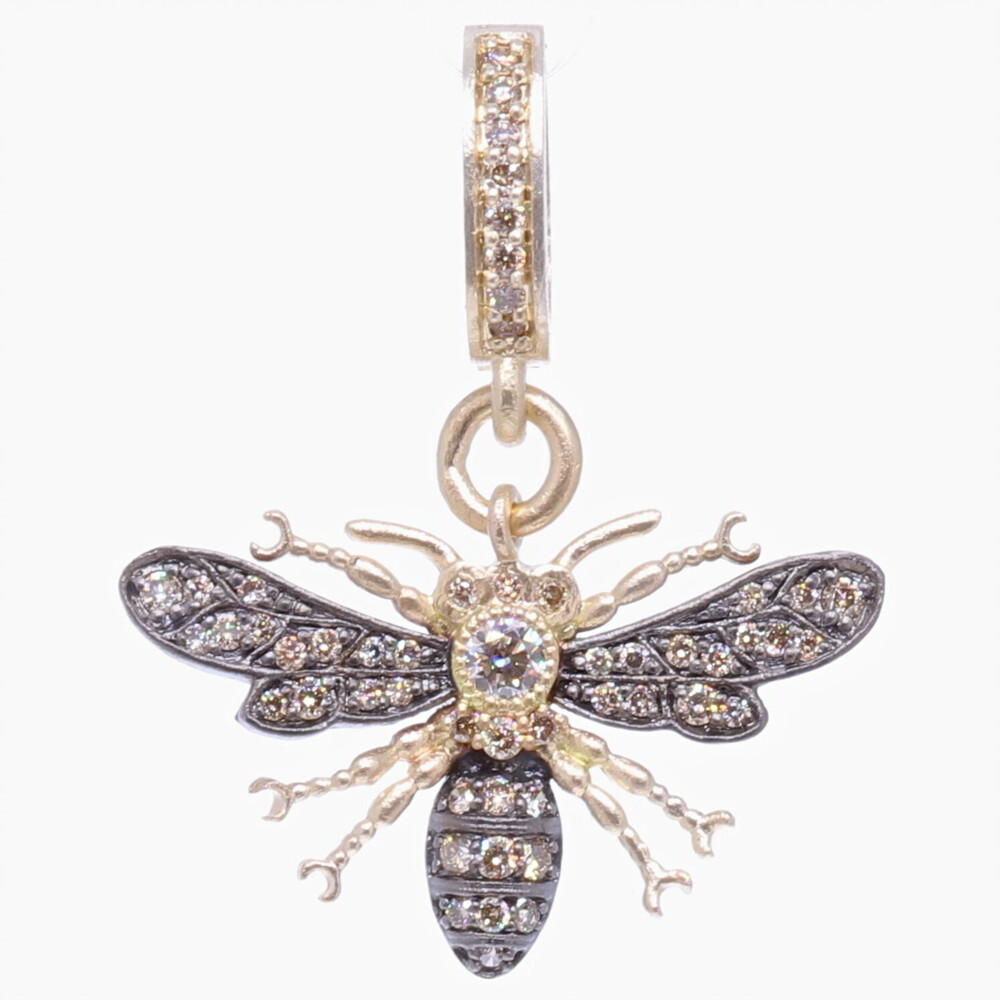 Buzzzz..... This classic bee pendant is handcrafted from solid 14k yellow gold 2.35g and champagne diamonds 0.50 tcw. It's perfect to stack it with one of our Ancient + Old pendants or onto a bracelet. Small Classic Bee Pendant