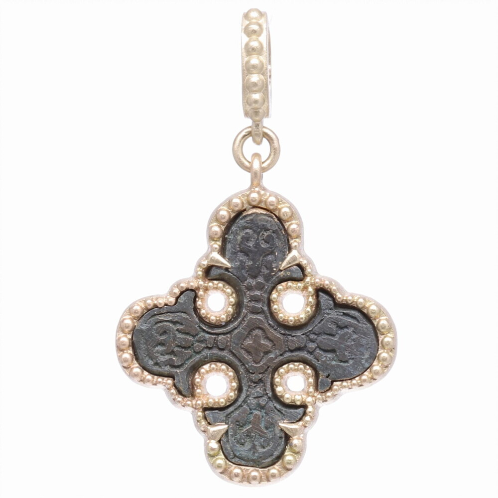 Wearing a cross offers the wearer protection from evil. This artifact has decorative hand-carved details on the front. This ancient cross has been set inside a solid 14k Yellow gold 8.97g bezel. The bale has a 4mm opening. Artifact Maltese Cross Pendant