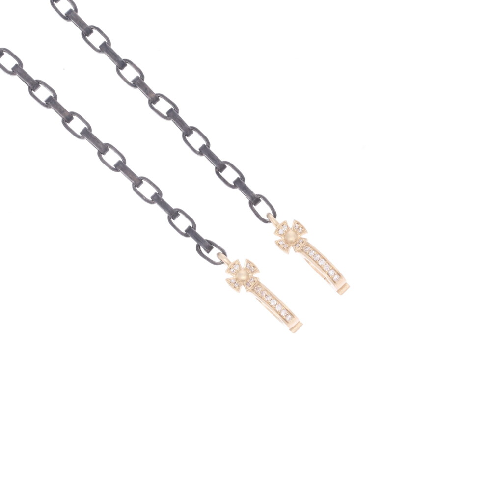 This chain has two bales that open so you can clip both ends on a pendant. The materials used are champagne diamonds 0.20 tcw, 14k yellow gold 3.81g, and rhodium silver. The length option provided is just calculating the chain. The yellow gold and diamond parts add 0.75" to the total length. Classic Cross Bale Display Necklace with Open-able Bales