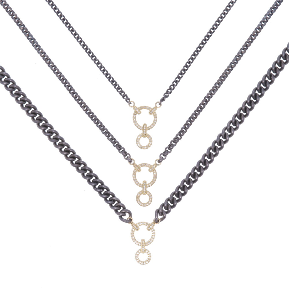 Handcrafted rhodium display chain that can hold 1-3 pendants comfortably. There are three options for chain style that can be at any length. The diamond weight is 0.32 tcw, with 3.10g of 14k gold. Classic Diamond Double Circle Display Necklace