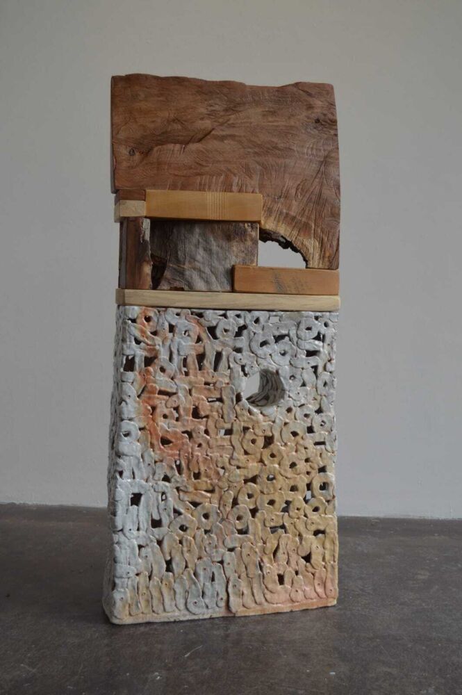 This sculpture combines salt glazed stoneware and assorted woods, beautifully demonstrating artist Brandon Reese's assertion that one element can bring out the characteristics of the other. Dunstin also demonstrates how simple and familiar materials can be used to extend the bounds of what we think we know about them. Dunstin