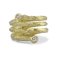 This attention-grabbing 19K yellow gold ring brought to you by Aaron Henry Designs brings beauty and refinement. It features a dazzling four-row olive branch coil and 0.105 carat diamonds. Olive Branch Coil Ring With Diamonds