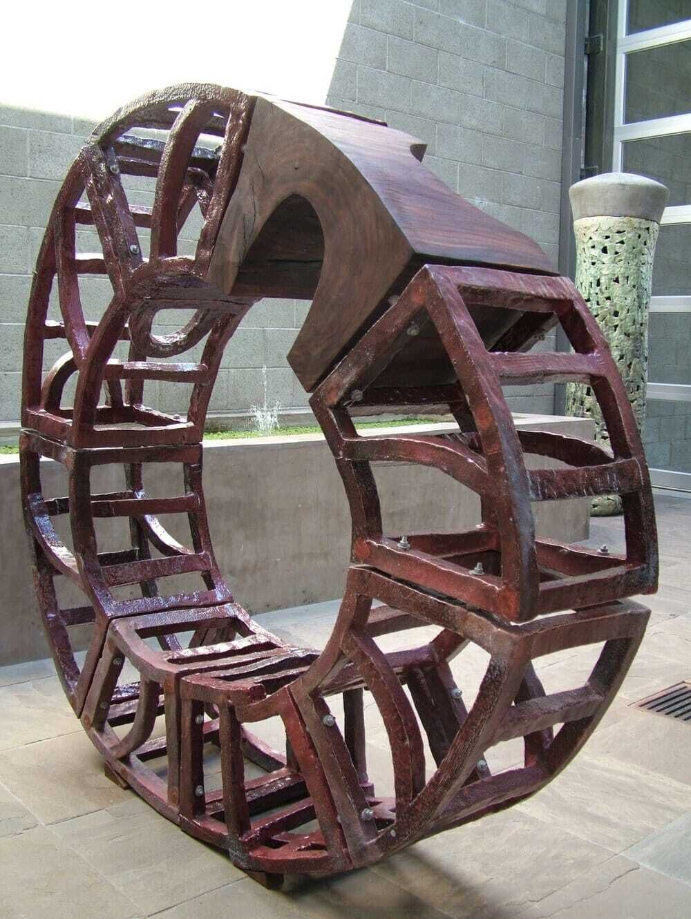 This sculpture by Brandon Reese combines salt glazed stoneware with walnut. Savannah represents the artist's fascination with interconnected relationships of elements and his bold vision to take simple and familiar materials of ceramic art and extend the bounds of what we think we know about them. Savannah