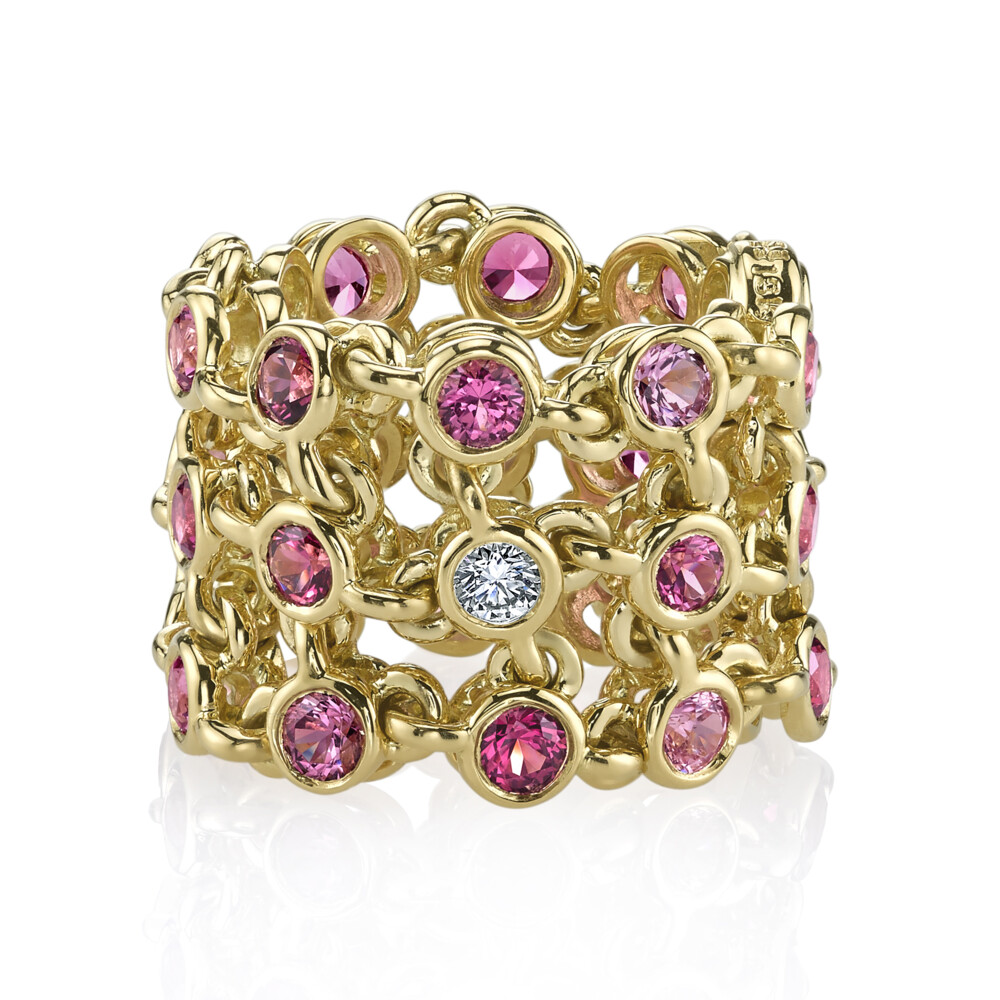 This eye-catching 18K yellow gold ring brought to you by Aaron Henry Designs brings heart-stopping elegance. It features a spectacular three-row celebration design and 3.71 carat spinels. Celebration Ring
