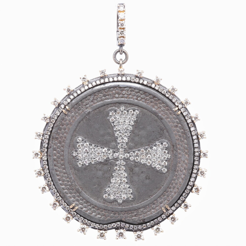 This original 17th Century Russian Maltese medal is set inside a Cynthia Ann bezel. The bezel consists of 14k yellow gold 4.91g, champagne diamonds 2.12 tcw, and rhodium sterling silver. The back displays Russia's coat of arms. The only alteration done to this original 1700's medal is diamond inlay on the original Maltese cross on the front. Cynthia Ann ancient + old collection consists of one of a kind pendants showcasing original antiquities, each are waiting to be re loved again. Russian Maltese 1700's Coat of Arms Pendant