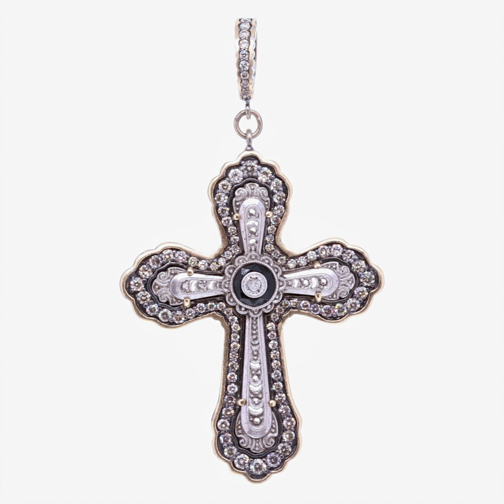 This original Edwardian Cross with Black Onyx has been set into a unique Cynthia Ann bezel. The Bezel has 1.59 tcw of Diamonds, 14k Yellow Gold 3.73g, and Rhodium Sterling Silver. The bale has a 4mm opening. Edwardian Cross Pendant