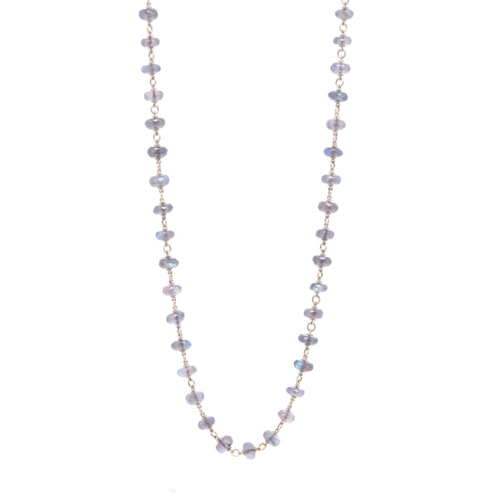 This 26" faceted labradorite necklace has a beautiful iridescent blue and green hue. The labradorite beads are strung with 14k Yellow Gold 11.52g. Labradorite Gold Necklace 26"