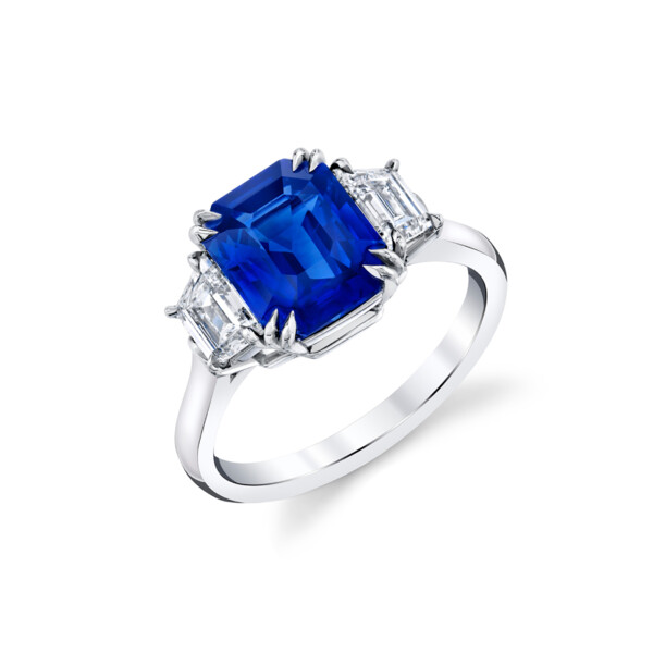 Closeup photo of 3.53 ct Emerald Cut Blue Sapphire-Ceylon  set in Platinum with 2 Trapezoid F/G, VS1 Diamonds ring
