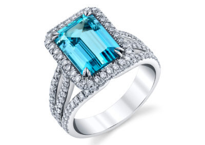 Platinum Ring set w/ a 3.12ct Emerald Cut Brazilian Aqua Marine and 0.83 ctw of Pave Diamonds Around the stone and down the Split Shank Band Ring
