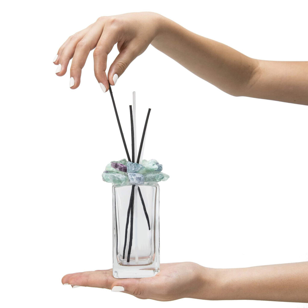 <font size="4"><span style="font-family: Lanae;"><font size="4">Fluorite Gemstone Scent Diffuser With Selenite & Wooden Sticks</font></span></font><div style="position: initial; margin: initial; font-family: "EB Garamond";"><font size="4"><br style="position: initial; margin: initial; font-family: "EB Garamond";"></font></div><div style="position: initial; margin: initial; font-family: "EB Garamond";"><p style="margin: initial; padding: 0px; border: 0px; font-variant-numeric: inherit; font-variant-east-asian: inherit; font-stretch: inherit; line-height: inherit; font-family: "EB Garamond"; vertical-align: baseline; color: rgb(51, 51, 51); position: initial;"><font size="4">Our gemstone diffusers are<span style="margin: initial; padding: 0px; border: 0px; font-style: inherit; font-variant: inherit; font-weight: inherit; font-stretch: inherit; line-height: inherit; font-family: "EB Garamond"; vertical-align: baseline; position: initial;"> </span>inspired by merging the benefits of high energy crystals with that of aromatherapy to create a product rich in healing.<br style="position: initial; margin: initial; font-family: "EB Garamond";"></font></p><p style="margin: initial; padding: 0px; border: 0px; font-variant-numeric: inherit; font-variant-east-asian: inherit; font-stretch: inherit; line-height: inherit; font-family: "EB Garamond"; vertical-align: baseline; color: rgb(51, 51, 51); position: initial;"><font size="4">This Gemstone Diffuser is carefully adorned with Brazilian Fluorite<span style="margin: initial; padding: 0px; border: 0px; font-style: inherit; font-variant: inherit; font-weight: inherit; font-stretch: inherit; line-height: inherit; font-family: "EB Garamond"; vertical-align: baseline; position: initial;"> </span>with great healing properties. Fluorite<span style="margin: initial; padding: 0px; border: 0px; font-style: inherit; font-variant: inherit; font-weight: inherit; font-stretch: inherit; line-height: inherit; font-family: "EB Garamond"; vertical-align: baseline; position: initial;"> </span>is loved for its ability to:</font></p><ul style="margin: initial; padding: 0px; border: 0px; font-variant-numeric: inherit; font-variant-east-asian: inherit; font-stretch: inherit; line-height: inherit; font-family: "EB Garamond"; vertical-align: baseline; color: rgb(51, 51, 51); position: initial;"><li style="margin: initial; padding: 0px; border: 0px; font-style: inherit; font-variant: inherit; font-weight: inherit; font-stretch: inherit; line-height: inherit; font-family: "EB Garamond"; vertical-align: baseline; list-style: outside disc; position: initial;"><font size="4">Absorb and neutralize negative energy & stress. <br style="position: initial; margin: initial; font-family: "EB Garamond";"></font></li><li style="margin: initial; padding: 0px; border: 0px; font-style: inherit; font-variant: inherit; font-weight: inherit; font-stretch: inherit; line-height: inherit; font-family: "EB Garamond"; vertical-align: baseline; list-style: outside disc; position: initial;"><div style="margin: initial; padding: 0px; border: 0px; font-style: inherit; font-variant: inherit; font-weight: inherit; font-stretch: inherit; line-height: inherit; font-family: "EB Garamond"; vertical-align: baseline; position: initial;"><font size="4">Assist with confidence, self-awareness and decision making.</font></div></li><li style="margin: initial; padding: 0px; border: 0px; font-style: inherit; font-variant: inherit; font-weight: inherit; font-stretch: inherit; line-height: inherit; font-family: "EB Garamond"; vertical-align: baseline; list-style: outside disc; position: initial;"><font size="4">Encourages positivity & balances energies.</font></li></ul><p style="margin: initial; padding: 0px; border: 0px; font-variant-numeric: inherit; font-variant-east-asian: inherit; font-stretch: inherit; line-height: inherit; font-family: "EB Garamond"; vertical-align: baseline; color: rgb(51, 51, 51); position: initial;"><font size="4">Height - 6"</font></p><p style="margin: initial; padding: 0px; border: 0px; font-variant-numeric: inherit; font-variant-east-asian: inherit; font-stretch: inherit; line-height: inherit; font-family: "EB Garamond"; vertical-align: baseline; color: rgb(51, 51, 51); position: initial;"><font size="4">Base - 2" x 2"</font></p><p style="margin: initial; padding: 0px; border: 0px; font-variant-numeric: inherit; font-variant-east-asian: inherit; font-stretch: inherit; line-height: inherit; font-family: "EB Garamond"; vertical-align: baseline; color: rgb(51, 51, 51); position: initial;"><font size="4">Your diffuser will arrive in a gift box as well as with wood sticks to help transfer the scent of the perfume used. It also comes with natural white Moroccan Selenite sticks for added decor. </font></p><p style="margin: initial; padding: 0px; border: 0px; font-variant-numeric: inherit; font-variant-east-asian: inherit; font-stretch: inherit; line-height: inherit; font-family: "EB Garamond"; vertical-align: baseline; color: rgb(51, 51, 51); position: initial;"><br></p><p style="margin: initial; padding: 0px; border: 0px; font-variant-numeric: inherit; font-variant-east-asian: inherit; font-stretch: inherit; line-height: inherit; font-family: "EB Garamond"; vertical-align: baseline; color: rgb(51, 51, 51); position: initial;"><font size="4">Please note that the diffuser does not come with any scents.</font></p><p style="margin: initial; padding: 0px; border: 0px; font-variant-numeric: inherit; font-variant-east-asian: inherit; font-stretch: inherit; line-height: inherit; font-family: "EB Garamond"; vertical-align: baseline; color: rgb(51, 51, 51); position: initial;"><font size="4">As our luxury diffusers are handmade, please allow for slight variations in size, shape, and color of the crystals.</font></p><p style="margin: initial; padding: 0px; border: 0px; font-variant-numeric: inherit; font-variant-east-asian: inherit; font-stretch: inherit; line-height: inherit; font-family: "EB Garamond"; vertical-align: baseline; color: rgb(51, 51, 51); position: initial;"><font size="4">Your satisfaction is 100% guaranteed with our 30-day warranty and money back guarantee.</font></p></div> Fluorite Gemstone Scent Diffuser With Selenite & Wooden Sticks
