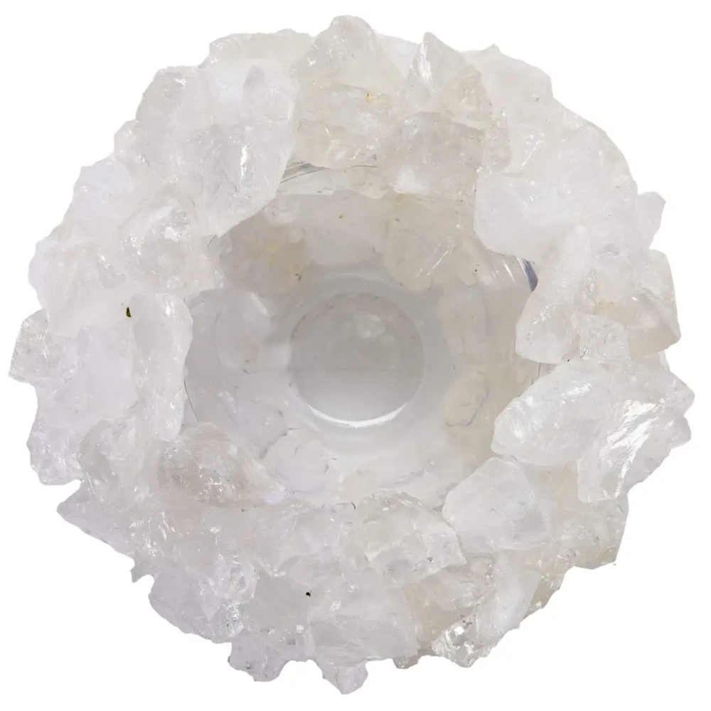 <font size="4"><span style="font-family: "EB Garamond";">Clear Quartz Gemstone Vase -Round</span></font><div style="position: initial; margin: initial; font-family: "EB Garamond";"><font size="4"><br style="position: initial; margin: initial; font-family: "EB Garamond";"></font></div><div style="position: initial; margin: initial; font-family: "EB Garamond";"><p style="margin: initial; padding: 0px; border: 0px; font-family: "EB Garamond"; font-stretch: inherit; line-height: inherit; vertical-align: baseline; caret-color: rgb(51, 51, 51); color: rgb(51, 51, 51); text-size-adjust: auto; position: initial;"><font size="4">Original, hand-made Quartz vase. </font></p><p style="margin: initial; padding: 0px; border: 0px; font-family: "EB Garamond"; font-stretch: inherit; line-height: inherit; vertical-align: baseline; caret-color: rgb(51, 51, 51); color: rgb(51, 51, 51); text-size-adjust: auto; position: initial;"><font size="4">Quartz is believed to:</font></p><ul style="margin: initial; padding: 0px; border: 0px; font-family: "EB Garamond"; font-stretch: inherit; line-height: inherit; vertical-align: baseline; caret-color: rgb(51, 51, 51); color: rgb(51, 51, 51); text-size-adjust: auto; position: initial;"><li style="margin: initial; padding: 0px; border: 0px; font-family: "EB Garamond"; font-style: inherit; font-variant-caps: inherit; font-weight: inherit; font-stretch: inherit; line-height: inherit; vertical-align: baseline; list-style: outside disc; position: initial;"><font size="4">Bring peace.</font></li><li style="margin: initial; padding: 0px; border: 0px; font-family: "EB Garamond"; font-style: inherit; font-variant-caps: inherit; font-weight: inherit; font-stretch: inherit; line-height: inherit; vertical-align: baseline; list-style: outside disc; position: initial;"><font size="4">Alleviate stress and anxiety.</font></li><li style="margin: initial; padding: 0px; border: 0px; font-family: "EB Garamond"; font-style: inherit; font-variant-caps: inherit; font-weight: inherit; font-stretch: inherit; line-height: inherit; vertical-align: baseline; list-style: outside disc; position: initial;"><font size="4">Amplify your energy and intentions.</font></li></ul><p style="margin: initial; padding: 0px; border: 0px; font-family: "EB Garamond"; font-stretch: inherit; line-height: inherit; vertical-align: baseline; caret-color: rgb(51, 51, 51); color: rgb(51, 51, 51); text-size-adjust: auto; position: initial;"><font size="4">This vase can serve as a wonderful<span style="margin: initial; padding: 0px; border: 0px; font-family: "EB Garamond"; font-style: inherit; font-variant-caps: inherit; font-weight: inherit; font-stretch: inherit; line-height: inherit; vertical-align: baseline; position: initial;"> </span>addition to your Bedroom, Bathroom, Zen Den, and more! The glass center is perfect for holding a candle or a plant to bring energy, healing, and beauty into your space. </font></p><p style="margin: initial; padding: 0px; border: 0px; font-family: "EB Garamond"; font-stretch: inherit; line-height: inherit; vertical-align: baseline; caret-color: rgb(51, 51, 51); color: rgb(51, 51, 51); text-size-adjust: auto; position: initial;"><font size="4">Vase Dimensions: 6" W x 4" H</font></p><p style="margin: initial; padding: 0px; border: 0px; font-family: "EB Garamond"; font-stretch: inherit; line-height: inherit; vertical-align: baseline; caret-color: rgb(51, 51, 51); color: rgb(51, 51, 51); text-size-adjust: auto; position: initial;"><font size="4">Inner glass dimensions: 3.5" x 3.5"</font></p><p style="margin: initial; padding: 0px; border: 0px; font-family: "EB Garamond"; font-stretch: inherit; line-height: inherit; vertical-align: baseline; caret-color: rgb(51, 51, 51); color: rgb(51, 51, 51); text-size-adjust: auto; position: initial;"><span style="margin: initial; padding: 0px; border: 0px; font-family: "EB Garamond"; font-style: inherit; font-variant-caps: inherit; font-weight: inherit; font-stretch: inherit; line-height: inherit; vertical-align: baseline; position: initial;"><font size="4">Each vase is handmade with natural stones, so please allow for slight variations in size, shape, and color.</font></span></p><p style="margin: initial; padding: 0px; border: 0px; font-family: "EB Garamond"; font-stretch: inherit; line-height: inherit; vertical-align: baseline; caret-color: rgb(51, 51, 51); color: rgb(51, 51, 51); text-size-adjust: auto; position: initial;"><span style="margin: initial; padding: 0px; border: 0px; font-family: "EB Garamond"; font-style: inherit; font-variant-caps: inherit; font-weight: inherit; font-stretch: inherit; line-height: inherit; vertical-align: baseline; position: initial;"><font size="4"><br></font></span></p><p style="margin: initial; padding: 0px; border: 0px; font-family: "EB Garamond"; font-stretch: inherit; line-height: inherit; vertical-align: baseline; caret-color: rgb(51, 51, 51); color: rgb(51, 51, 51); text-size-adjust: auto; position: initial;"><span style="margin: initial; padding: 0px; border: 0px; font-family: "EB Garamond"; font-style: inherit; font-variant-caps: inherit; font-weight: inherit; font-stretch: inherit; line-height: inherit; vertical-align: baseline; position: initial;"><font size="4">*Flowers are not included.</font></span></p></div> Clear Quartz Gemstone Vase -Round