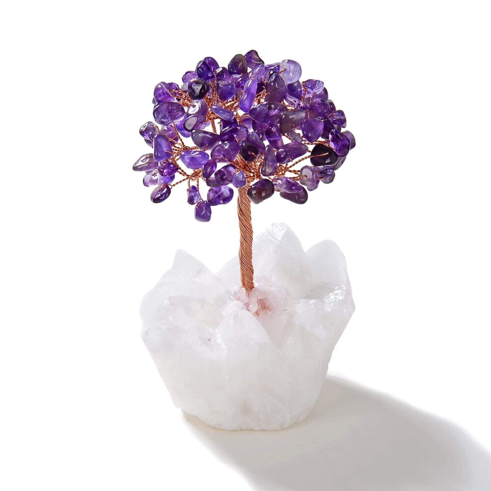 <font size="4"><span style="font-family: "EB Garamond";">Amethyst Beaded Gemstone Tree On Quartz Crystal Base</span></font><div style="position: initial; margin: initial; font-family: "EB Garamond";"><font size="4"><br style="position: initial; margin: initial; font-family: "EB Garamond";"></font></div><div style="position: initial; margin: initial; font-family: "EB Garamond";"><p style="margin: initial; padding: 0px; border: 0px; font-variant-numeric: inherit; font-variant-east-asian: inherit; font-stretch: inherit; line-height: inherit; font-family: "EB Garamond"; vertical-align: baseline; color: rgb(51, 51, 51); position: initial;"><font size="4">All natural semi-precious gemstones estimated at 108 pieces.</font></p><p style="margin: initial; padding: 0px; border: 0px; font-variant-numeric: inherit; font-variant-east-asian: inherit; font-stretch: inherit; line-height: inherit; font-family: "EB Garamond"; vertical-align: baseline; color: rgb(51, 51, 51); position: initial;"><font size="4">Featured on this tree is natural Amethyst. Amethyst is believed to:</font></p><ul style="margin: initial; padding: 0px; border: 0px; font-variant-numeric: inherit; font-variant-east-asian: inherit; font-stretch: inherit; line-height: inherit; font-family: "EB Garamond"; vertical-align: baseline; color: rgb(51, 51, 51); position: initial;"><li style="margin: initial; padding: 0px; border: 0px; font-style: inherit; font-variant: inherit; font-weight: inherit; font-stretch: inherit; line-height: inherit; font-family: "EB Garamond"; vertical-align: baseline; list-style: outside disc; position: initial;"><font size="4">Serve as a natural tranquilizer.</font></li><li style="margin: initial; padding: 0px; border: 0px; font-style: inherit; font-variant: inherit; font-weight: inherit; font-stretch: inherit; line-height: inherit; font-family: "EB Garamond"; vertical-align: baseline; list-style: outside disc; position: initial;"><font size="4">Relieve stress.</font></li><li style="margin: initial; padding: 0px; border: 0px; font-style: inherit; font-variant: inherit; font-weight: inherit; font-stretch: inherit; line-height: inherit; font-family: "EB Garamond"; vertical-align: baseline; list-style: outside disc; position: initial;"><font size="4">Dispel anger and fear.</font></li><li style="margin: initial; padding: 0px; border: 0px; font-style: inherit; font-variant: inherit; font-weight: inherit; font-stretch: inherit; line-height: inherit; font-family: "EB Garamond"; vertical-align: baseline; list-style: outside disc; position: initial;"><font size="4">Activates spiritual awareness.</font></li></ul><p style="margin: initial; padding: 0px; border: 0px; font-variant-numeric: inherit; font-variant-east-asian: inherit; font-stretch: inherit; line-height: inherit; font-family: "EB Garamond"; vertical-align: baseline; color: rgb(51, 51, 51); position: initial;"><font size="4">This beautiful tree rests on a natural Brazilian Quartz base. Clear Quartz is believed to:</font></p><ul style="margin: initial; padding: 0px; border: 0px; font-variant-numeric: inherit; font-variant-east-asian: inherit; font-stretch: inherit; line-height: inherit; font-family: "EB Garamond"; vertical-align: baseline; color: rgb(51, 51, 51); position: initial;"><li style="margin: initial; padding: 0px; border: 0px; font-style: inherit; font-variant: inherit; font-weight: inherit; font-stretch: inherit; line-height: inherit; font-family: "EB Garamond"; vertical-align: baseline; list-style: outside disc; position: initial;"><font size="4">Bring peace.</font></li><li style="margin: initial; padding: 0px; border: 0px; font-style: inherit; font-variant: inherit; font-weight: inherit; font-stretch: inherit; line-height: inherit; font-family: "EB Garamond"; vertical-align: baseline; list-style: outside disc; position: initial;"><font size="4">Alleviate stress and anxiety.</font></li><li style="margin: initial; padding: 0px; border: 0px; font-style: inherit; font-variant: inherit; font-weight: inherit; font-stretch: inherit; line-height: inherit; font-family: "EB Garamond"; vertical-align: baseline; list-style: outside disc; position: initial;"><font size="4">Amplify your energy and intentions.</font></li></ul><p style="margin: initial; padding: 0px; border: 0px; font-variant-numeric: inherit; font-variant-east-asian: inherit; font-stretch: inherit; line-height: inherit; font-family: "EB Garamond"; vertical-align: baseline; color: rgb(51, 51, 51); position: initial;"><font size="4">Measures at 4 inches tall.</font></p><p style="margin: initial; padding: 0px; border: 0px; font-variant-numeric: inherit; font-variant-east-asian: inherit; font-stretch: inherit; line-height: inherit; font-family: "EB Garamond"; vertical-align: baseline; color: rgb(51, 51, 51); position: initial;"><font size="4">As this is an original, hand-made gemstone tree, please allow for slight variations in size and color of the gemstones shown.</font></p></div> Amethyst Beaded Gemstone Tree On Quartz Crystal Base