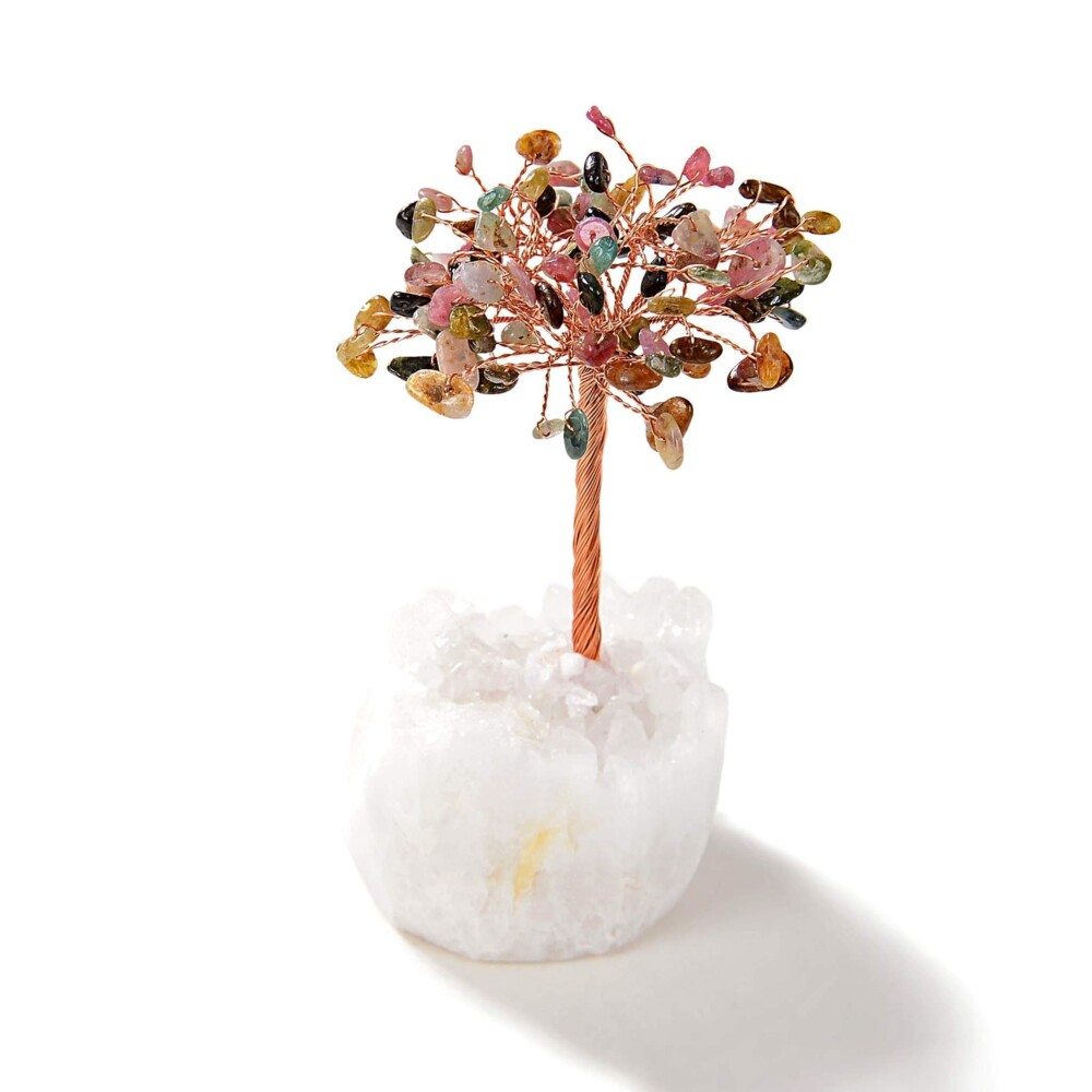<font size="4"><span style="font-family: "EB Garamond";">Multi-tourmaline Beaded Gemstone Tree On Quartz Crystal Base</span></font><div style="position: initial; margin: initial; font-family: "EB Garamond";"><font size="4"><br style="position: initial; margin: initial; font-family: "EB Garamond";"></font></div><div style="position: initial; margin: initial; font-family: "EB Garamond";"><p style="margin: initial; padding: 0px; border: 0px; font-variant-numeric: inherit; font-variant-east-asian: inherit; font-stretch: inherit; line-height: inherit; font-family: "EB Garamond"; vertical-align: baseline; color: rgb(51, 51, 51); position: initial;"><font size="4">All natural semi-precious gemstones estimated at 107 pieces.</font></p><p style="margin: initial; padding: 0px; border: 0px; font-variant-numeric: inherit; font-variant-east-asian: inherit; font-stretch: inherit; line-height: inherit; font-family: "EB Garamond"; vertical-align: baseline; color: rgb(51, 51, 51); position: initial;"><font size="4">This tree features gem grade Tourmaline. It is believed to:</font></p><ul style="margin: initial; padding: 0px; border: 0px; font-variant-numeric: inherit; font-variant-east-asian: inherit; font-stretch: inherit; line-height: inherit; font-family: "EB Garamond"; vertical-align: baseline; color: rgb(51, 51, 51); position: initial;"><li style="margin: initial; padding: 0px; border: 0px; font-style: inherit; font-variant: inherit; font-weight: inherit; font-stretch: inherit; line-height: inherit; font-family: "EB Garamond"; vertical-align: baseline; list-style: outside disc; position: initial;"><font size="4">Inspire confidence.</font></li><li style="margin: initial; padding: 0px; border: 0px; font-style: inherit; font-variant: inherit; font-weight: inherit; font-stretch: inherit; line-height: inherit; font-family: "EB Garamond"; vertical-align: baseline; list-style: outside disc; position: initial;"><font size="4">Dispels fear from any space that it inhabits.</font></li><li style="margin: initial; padding: 0px; border: 0px; font-style: inherit; font-variant: inherit; font-weight: inherit; font-stretch: inherit; line-height: inherit; font-family: "EB Garamond"; vertical-align: baseline; list-style: outside disc; position: initial;"><font size="4">Promote self-confidence.</font></li><li style="margin: initial; padding: 0px; border: 0px; font-style: inherit; font-variant: inherit; font-weight: inherit; font-stretch: inherit; line-height: inherit; font-family: "EB Garamond"; vertical-align: baseline; list-style: outside disc; position: initial;"><font size="4">Attracts inspiration, compassion, tolerance and prosperity.</font></li></ul><p style="margin: initial; padding: 0px; border: 0px; font-variant-numeric: inherit; font-variant-east-asian: inherit; font-stretch: inherit; line-height: inherit; font-family: "EB Garamond"; vertical-align: baseline; color: rgb(51, 51, 51); position: initial;"><font size="4">This beautiful tree rests on a natural Brazilian Quartz base. Clear Quartz is believed to:</font></p><ul style="margin: initial; padding: 0px; border: 0px; font-variant-numeric: inherit; font-variant-east-asian: inherit; font-stretch: inherit; line-height: inherit; font-family: "EB Garamond"; vertical-align: baseline; color: rgb(51, 51, 51); position: initial;"><li style="margin: initial; padding: 0px; border: 0px; font-style: inherit; font-variant: inherit; font-weight: inherit; font-stretch: inherit; line-height: inherit; font-family: "EB Garamond"; vertical-align: baseline; list-style: outside disc; position: initial;"><font size="4">Bring peace.</font></li><li style="margin: initial; padding: 0px; border: 0px; font-style: inherit; font-variant: inherit; font-weight: inherit; font-stretch: inherit; line-height: inherit; font-family: "EB Garamond"; vertical-align: baseline; list-style: outside disc; position: initial;"><font size="4">Alleviate stress and anxiety.</font></li><li style="margin: initial; padding: 0px; border: 0px; font-style: inherit; font-variant: inherit; font-weight: inherit; font-stretch: inherit; line-height: inherit; font-family: "EB Garamond"; vertical-align: baseline; list-style: outside disc; position: initial;"><font size="4">Amplify your energy and intentions.</font></li></ul><p style="margin: initial; padding: 0px; border: 0px; font-variant-numeric: inherit; font-variant-east-asian: inherit; font-stretch: inherit; line-height: inherit; font-family: "EB Garamond"; vertical-align: baseline; color: rgb(51, 51, 51); position: initial;"><font size="4">Measures at 4 inches tall.</font></p><p style="margin: initial; padding: 0px; border: 0px; font-variant-numeric: inherit; font-variant-east-asian: inherit; font-stretch: inherit; line-height: inherit; font-family: "EB Garamond"; vertical-align: baseline; color: rgb(51, 51, 51); position: initial;"><font size="4">As this is an original, hand-made gemstone tree, please allow for slight variations in the size and color of the gemstones shown.</font></p></div> Multi-tourmaline Beaded Gemstone Tree On Quartz Crystal Base
