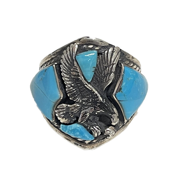 <font face="EB Garamond"><font style="" size="4"><font style="font-family: "EB Garamond"; color: rgb(0, 0, 0);">The American Eagle is the symbol of our great nation, with bright inlaid </font><span style="font-family: "EB Garamond"; color: rgb(0, 0, 0);">Turquoise</span><font style="font-family: "EB Garamond"; color: rgb(0, 0, 0);"> & ornately detailed sterling silver Eagle, this ring is a sentimental piece for anyone who is passionate for supporting our country. Turquoise is a universal healing stone & a Stone of the Ancients. It represents wisdom, tranquility, protection, good fortune & hope. </font></font></font> AZ Turquoise Eagle Ring -Asymmetrical Triangle Cabochons With Oxidized Silver Stamped Bezel Sz11