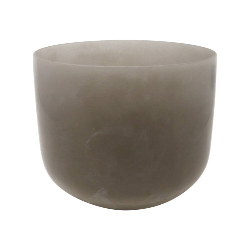 <div style="position: initial; margin: initial; font-family: "EB Garamond";"><font style="font-family: "EB Garamond";" size="4">This quartz crystal singing bowl has been infused with obsidian giving it that rich color. This stunning bowl has been tuned to a perfect G note.</font></div><div style="position: initial; margin: initial; font-family: "EB Garamond";"><font style="font-family: "EB Garamond";" size="4">How they are made- Crystal singing bowls are made from 99.992 percent pure quartz crystal that is crushed and heated to approximately 4000 degrees in a centrifugal mold. The bowls emit a powerful, pure resonance. The thickness of the bowl, as well as the height and diameter, determine the specific vibrational frequency of the bowl. Crystal Singing bowls first came to market as healing tools in 1980s. Tibetan metal bowls which, work in a similar way, have been in use for centuries. </font></div><div style="position: initial; margin: initial; font-family: "EB Garamond";"><font style="font-family: "EB Garamond";" size="4">Perfect G note- This singing bowl is tuned perfectly to the G note. The G note is associated with your throat chakra. Your throat chakra is located between the third and fifth neck vertebrae and opens towards the throat. Centrally it lies at the base of the neck. The throat chakra is connected to the way you express your life with utmost authenticity. It is about communicating your thoughts, feelings, and intentions clearly and accurately. The throat chakra is the place where we work on expanding our voice and the power of will.</font></div><div style="position: initial; margin: initial; font-family: "EB Garamond";"><font style="font-family: "EB Garamond";" size="4">Obsidian- Instead of hiding from our inner truth, Obsidian shines a light on the negativity and clears it away, helping us to choose the path leading towards light and love. Obsidian is a strongly protective stone, forming a shield against emotional negativity. It grounds you to the earth through the base chakra and strengthens you in times of need. </font></div><div style="position: initial; margin: initial; font-family: "EB Garamond";"><font style="font-family: "EB Garamond";" size="4">How to use your crystal singing bowl- LIGHTLY tap the bowl just to get the vibration going. As you firmly press the accompanying mallet in a circular motion against the bowls outside edge or rim. When you hear a bright clear tone, you can slow down the motion. Use your full arm to make the motion, rather than just rotating your wrist. You will start to feel the relaxation set in and your mind going into the zone. This will help with meditation, relaxation and focus. </font></div><div style="position: initial; margin: initial; font-family: "EB Garamond";"><font style="font-family: "EB Garamond";" size="4">Includes suede wand and rubber ring holder.</font></div> 8" Gem Infused Quartz Singing Bowl Note G Perfect Obsidian C06