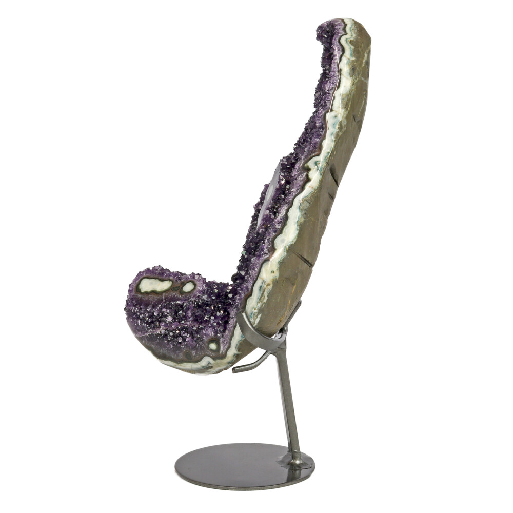 <font size="4"><span style="font-family: "EB Garamond";">Amethyst Plaque In Stand With Polished Stalactite Eyes</span></font><div style="position: initial; margin: initial; font-family: "EB Garamond";"><p style="margin: initial; font-variant-numeric: normal; font-variant-east-asian: normal; font-stretch: normal; line-height: normal; font-family: "EB Garamond"; color: rgb(0, 0, 0); position: initial;"><span style="position: initial; margin: initial; font-family: "EB Garamond";"><font size="4"><br></font></span></p><p style="margin: initial; font-variant-numeric: normal; font-variant-east-asian: normal; font-stretch: normal; line-height: normal; font-family: "EB Garamond"; color: rgb(0, 0, 0); position: initial;"><span style="position: initial; margin: initial; font-family: "EB Garamond";"><font size="4">AMETHYST DRUZY STALACTITE</font></span></p><p style="margin: initial; font-variant-numeric: normal; font-variant-east-asian: normal; font-stretch: normal; line-height: normal; font-family: "EB Garamond"; color: rgb(0, 0, 0); position: initial;"><font size="4">“</font><span style="font-size: 1.2rem;">Gem of Secret Expansion of the Higher Self”</span></p><p style="margin: initial; font-variant-numeric: normal; font-variant-east-asian: normal; font-stretch: normal; line-height: normal; font-family: "EB Garamond"; color: rgb(0, 0, 0); position: initial;"><span style="position: initial; margin: initial; font-family: "EB Garamond";"><font size="4">Quartz Stalactite </font></span><span style="font-size: 1.2rem;">are comprised of a unique core of agate encrusted</span></p><p style="margin: initial; font-variant-numeric: normal; font-variant-east-asian: normal; font-stretch: normal; line-height: normal; font-family: "EB Garamond"; color: rgb(0, 0, 0); position: initial;"><font size="4">with small terminated crystals found formed on the walls of geodes!</font></p><p style="margin: initial; font-variant-numeric: normal; font-variant-east-asian: normal; font-stretch: normal; line-height: normal; font-family: "EB Garamond"; color: rgb(0, 0, 0); position: initial;"><font size="4">Often resembling a floral pattern when cut into, each stalactite is</font></p><p style="margin: initial; font-variant-numeric: normal; font-variant-east-asian: normal; font-stretch: normal; line-height: normal; font-family: "EB Garamond"; color: rgb(0, 0, 0); position: initial;"><font size="4">unique and each slice of the column differs. Compared to the more</font></p><p style="margin: initial; font-variant-numeric: normal; font-variant-east-asian: normal; font-stretch: normal; line-height: normal; font-family: "EB Garamond"; color: rgb(0, 0, 0); position: initial;"><font size="4">commonly known calcite stalactites found within caves, there is a</font></p><p style="margin: initial; font-variant-numeric: normal; font-variant-east-asian: normal; font-stretch: normal; line-height: normal; font-family: "EB Garamond"; color: rgb(0, 0, 0); position: initial;"><font size="4">difference in way of formation. The stalactites in our collection are</font></p><p style="margin: initial; font-variant-numeric: normal; font-variant-east-asian: normal; font-stretch: normal; line-height: normal; font-family: "EB Garamond"; color: rgb(0, 0, 0); position: initial;"><font size="4">mostly from Uruguay and Brazil. Stalactites carry the energy of fire and</font></p><p style="margin: initial; font-variant-numeric: normal; font-variant-east-asian: normal; font-stretch: normal; line-height: normal; font-family: "EB Garamond"; color: rgb(0, 0, 0); position: initial;"><font size="4">passion, creativity and spirituality, yet bears the logic of temperance</font></p><p style="margin: initial; font-variant-numeric: normal; font-variant-east-asian: normal; font-stretch: normal; line-height: normal; font-family: "EB Garamond"; color: rgb(0, 0, 0); position: initial;"><font size="4">and sobriety.</font></p><div style="position: initial; margin: initial;"><br style="position: initial; margin: initial;"></div></div> Amethyst Plaque In Stand With Polished Stalactite Eyes
