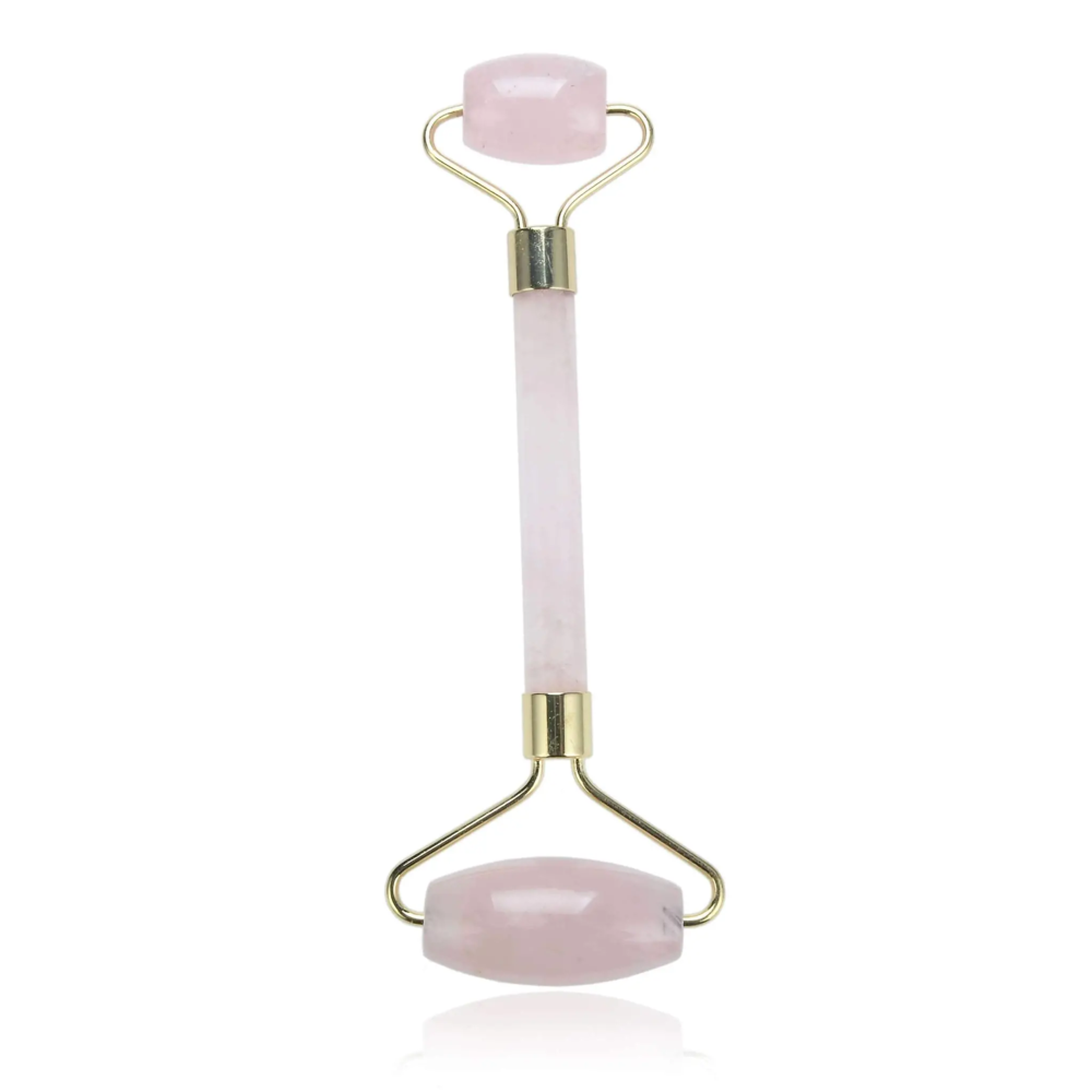 <font size="4"><span style="font-family: "EB Garamond";">Rose Quartz Facial Roller With Gold Plated Hardware</span></font><div style="position: initial; margin: initial; font-family: "EB Garamond";"><font size="4"><br style="position: initial; margin: initial; font-family: "EB Garamond";"></font></div><div style="position: initial; margin: initial; font-family: "EB Garamond";"><p style="margin: initial; padding: 0px; border: 0px; font-family: "EB Garamond"; font-stretch: inherit; line-height: inherit; vertical-align: baseline; caret-color: rgb(51, 51, 51); color: rgb(51, 51, 51); text-size-adjust: auto; position: initial;"><font size="4">Natural Rose Quartz face roller that assists lymphatic drainage to reduce the appearance of wrinkles, and puffiness. This roller acts as a massage tool for your face. You can use it alone or in conjunction with your skin care routine.</font></p><p style="margin: initial; padding: 0px; border: 0px; font-family: "EB Garamond"; font-stretch: inherit; line-height: inherit; vertical-align: baseline; caret-color: rgb(51, 51, 51); color: rgb(51, 51, 51); text-size-adjust: auto; position: initial;"><font size="4">Rose Quartz is a natural healing stone believed to bring love and beauty.</font></p><p style="margin: initial; padding: 0px; border: 0px; font-family: "EB Garamond"; font-stretch: inherit; line-height: inherit; vertical-align: baseline; caret-color: rgb(51, 51, 51); color: rgb(51, 51, 51); text-size-adjust: auto; position: initial;"><font size="4">Face rollers are excellent in assisting with the following:</font></p><ul style="margin: initial; padding: 0px; border: 0px; font-family: "EB Garamond"; font-stretch: inherit; line-height: inherit; vertical-align: baseline; caret-color: rgb(51, 51, 51); color: rgb(51, 51, 51); text-size-adjust: auto; position: initial;"><li style="margin: initial; padding: 0px; border: 0px; font-family: "EB Garamond"; font-style: inherit; font-variant-caps: inherit; font-stretch: inherit; line-height: inherit; vertical-align: baseline; list-style: outside disc; position: initial;"><font size="4">Helps fight wrinkles </font></li><li style="margin: initial; padding: 0px; border: 0px; font-family: "EB Garamond"; font-style: inherit; font-variant-caps: inherit; font-stretch: inherit; line-height: inherit; vertical-align: baseline; list-style: outside disc; position: initial;"><font size="4">Helps blood circulation to the face, and assists in detoxification </font></li><li style="margin: initial; padding: 0px; border: 0px; font-family: "EB Garamond"; font-style: inherit; font-variant-caps: inherit; font-stretch: inherit; line-height: inherit; vertical-align: baseline; list-style: outside disc; position: initial;"><font size="4">Decreases puffiness under eyes and around face</font></li><li style="margin: initial; padding: 0px; border: 0px; font-family: "EB Garamond"; font-style: inherit; font-variant-caps: inherit; font-stretch: inherit; line-height: inherit; vertical-align: baseline; list-style: outside disc; position: initial;"><font size="4">Brings a natural glow to your face</font></li><li style="margin: initial; padding: 0px; border: 0px; font-family: "EB Garamond"; font-style: inherit; font-variant-caps: inherit; font-stretch: inherit; line-height: inherit; vertical-align: baseline; list-style: outside disc; position: initial;"><font size="4">Helps tighten skin, making it appear more youthful</font></li><li style="margin: initial; padding: 0px; border: 0px; font-family: "EB Garamond"; font-style: inherit; font-variant-caps: inherit; font-stretch: inherit; line-height: inherit; vertical-align: baseline; list-style: outside disc; position: initial;"><font size="4">Helps absorb moisturizers and serums more fully</font></li></ul><p style="margin: initial; padding: 0px; border: 0px; font-family: "EB Garamond"; font-stretch: inherit; line-height: inherit; vertical-align: baseline; caret-color: rgb(51, 51, 51); color: rgb(51, 51, 51); text-size-adjust: auto; position: initial;"><font size="4">As each stone is one of a kind and unique, please allow for variations in color and texture in the face roller that you receive versus the one photographed. Your satisfaction is 100% guaranteed or your money back.</font></p><p style="margin: initial; padding: 0px; border: 0px; font-family: "EB Garamond"; font-stretch: inherit; line-height: inherit; vertical-align: baseline; caret-color: rgb(51, 51, 51); color: rgb(51, 51, 51); text-size-adjust: auto; position: initial;"><font size="4">Length: 6 inches.</font></p><p style="margin: initial; padding: 0px; border: 0px; font-family: "EB Garamond"; font-stretch: inherit; line-height: inherit; vertical-align: baseline; caret-color: rgb(51, 51, 51); color: rgb(51, 51, 51); text-size-adjust: auto; position: initial;"><font size="4">Width: 2 inches.</font></p></div> Rose Quartz Facial Roller With Gold Plated Hardware